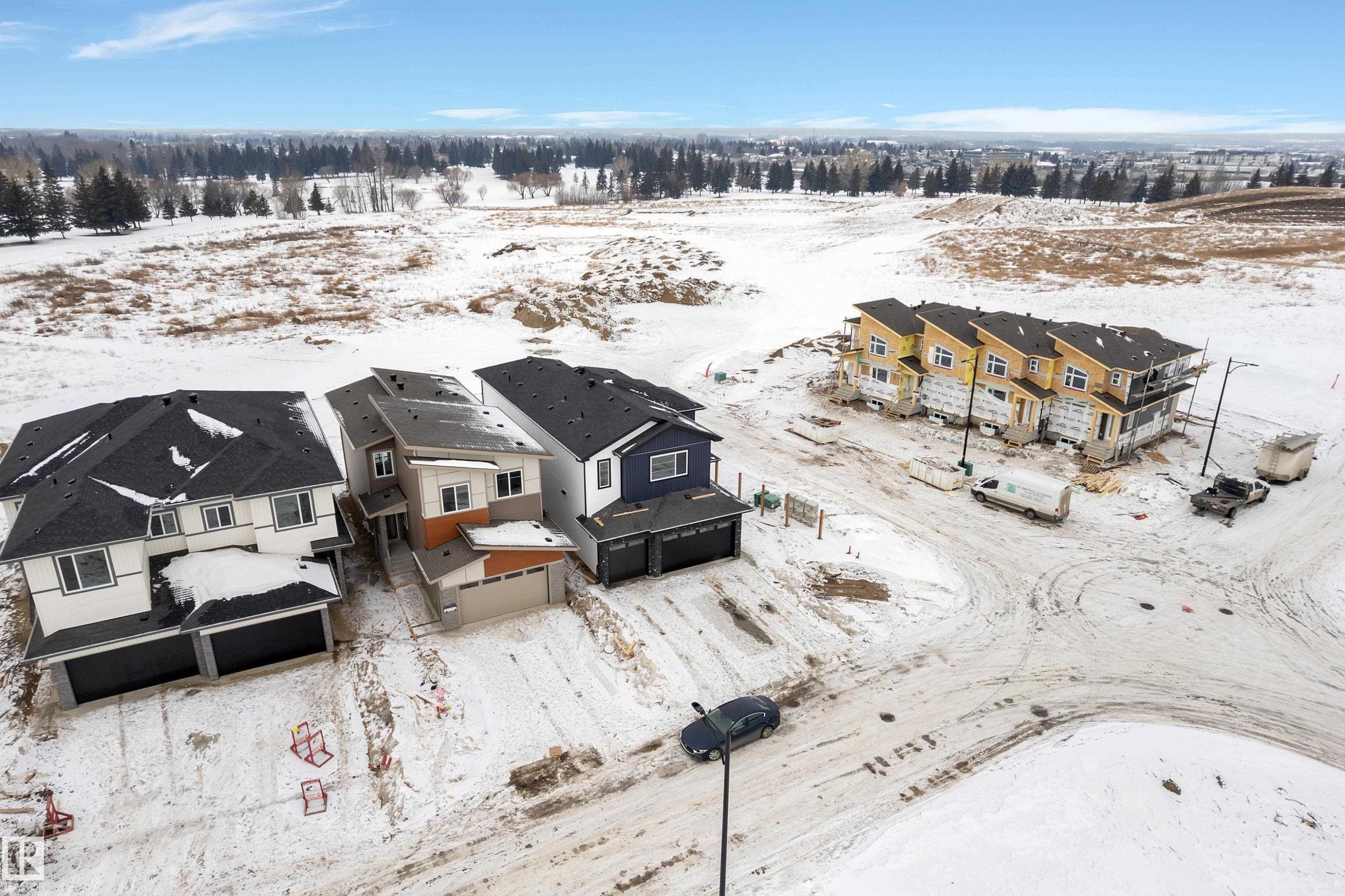 Snowy aerial view featuring a residential view - 40 Grayson Green, Stony Plain, AB - Outdoor With View
