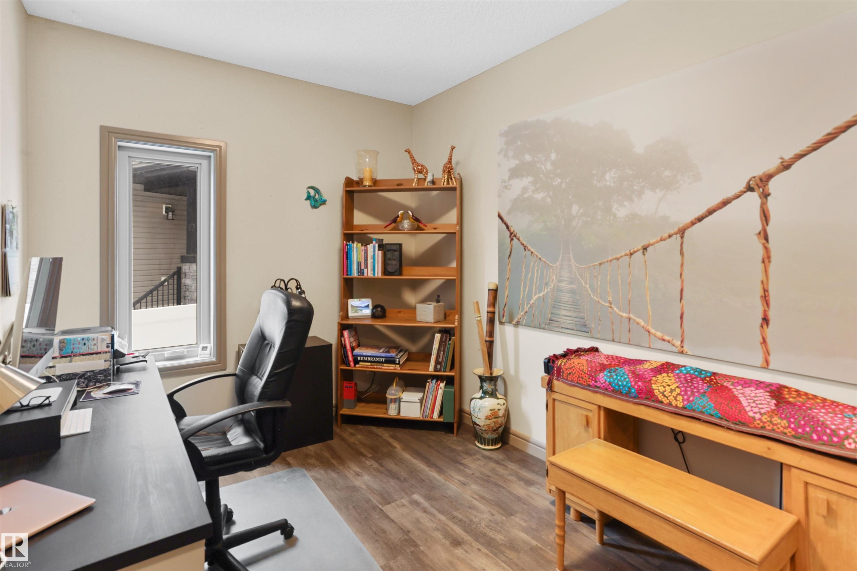 Office area featuring dark wood-style flooring - 97 Astoria Point(E), Devon, AB - Indoor