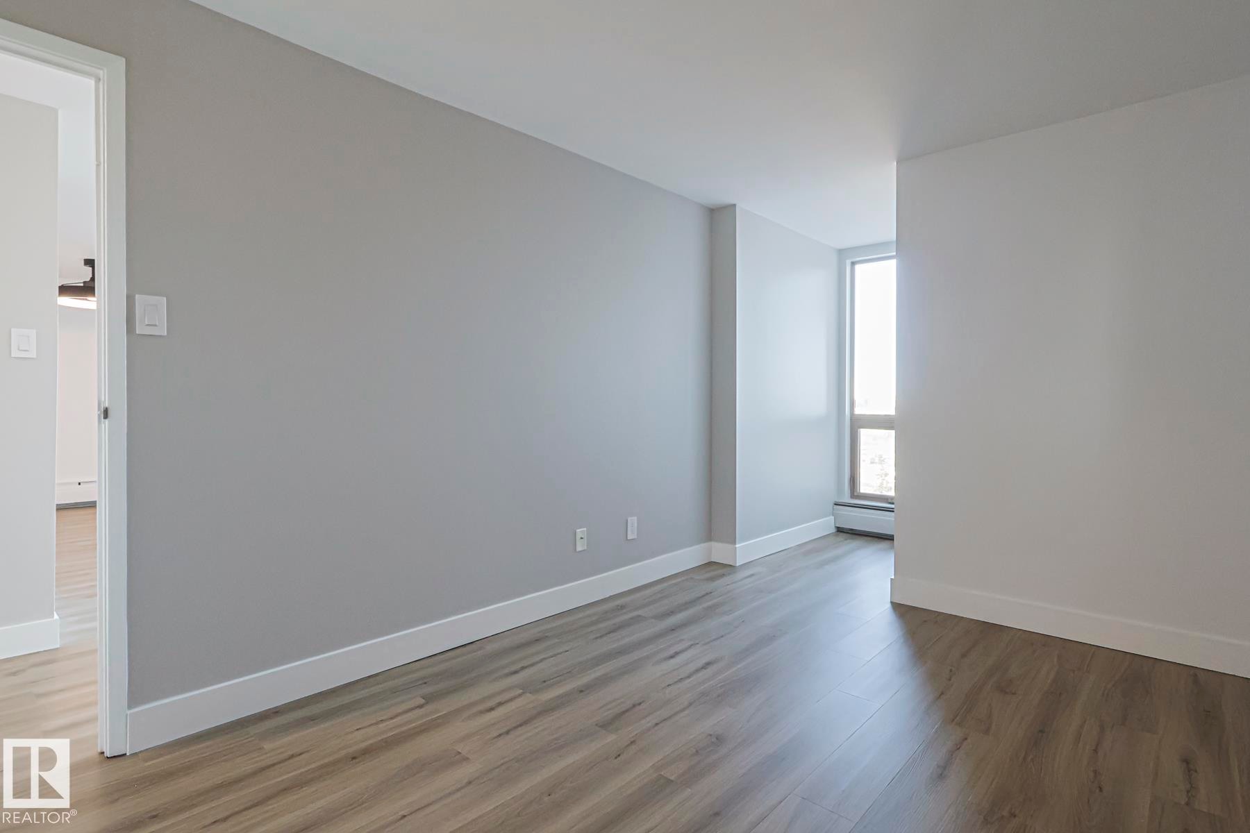 Primary bedroom includes walk in closet, ensuite with tub/shower and extra shelving - 505 10149 Saskatchewan Drive, Edmonton, AB - Indoor Photo Showing Other Room