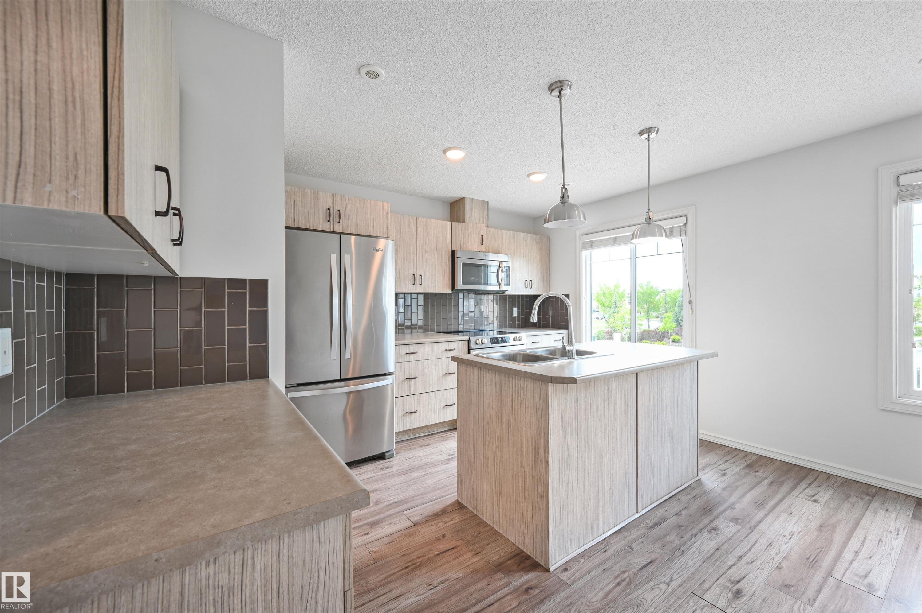 3 2215 24 Street, Edmonton, AB - Indoor Photo Showing Kitchen With Stainless Steel Kitchen