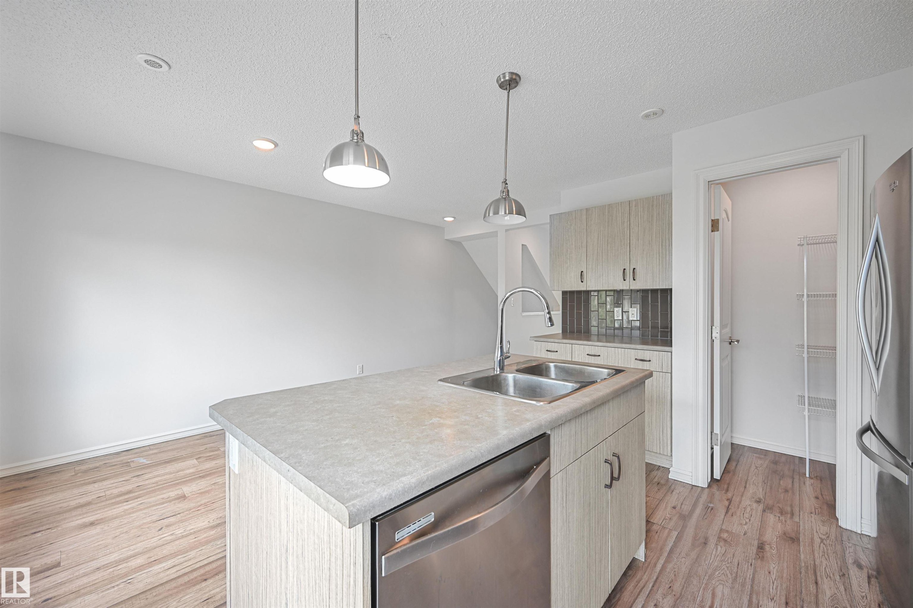 3 2215 24 Street, Edmonton, AB - Indoor Photo Showing Kitchen With Stainless Steel Kitchen With Double Sink