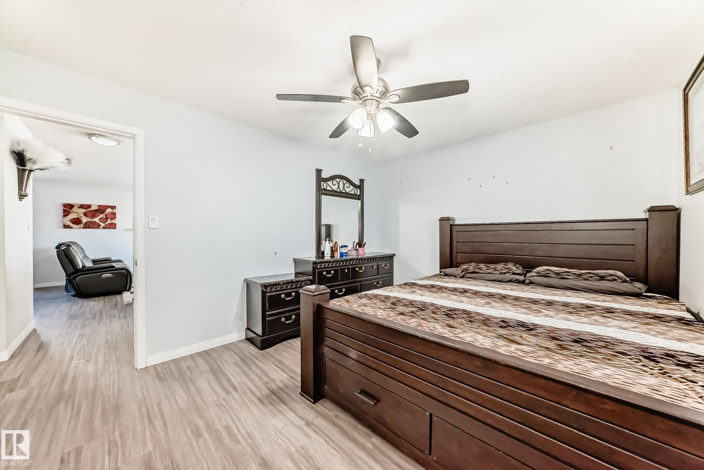 Bedroom featuring light wood-type flooring and a ceiling fan - 6 Jefferson Road, Edmonton, AB - Indoor Photo Showing Bedroom