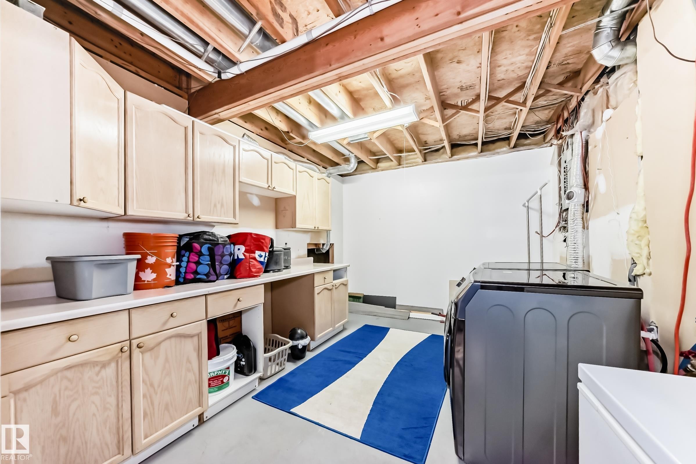Laundry area with concrete floors and washer and dryer - 6 Jefferson Road, Edmonton, AB - Indoor Photo Showing Laundry Room
