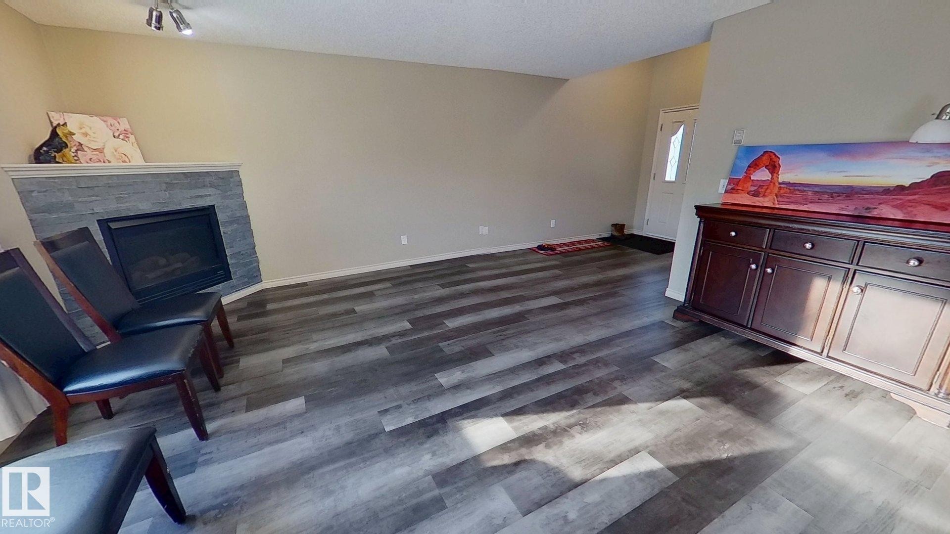 3811 Mclean Close, Edmonton, AB - Indoor With Fireplace