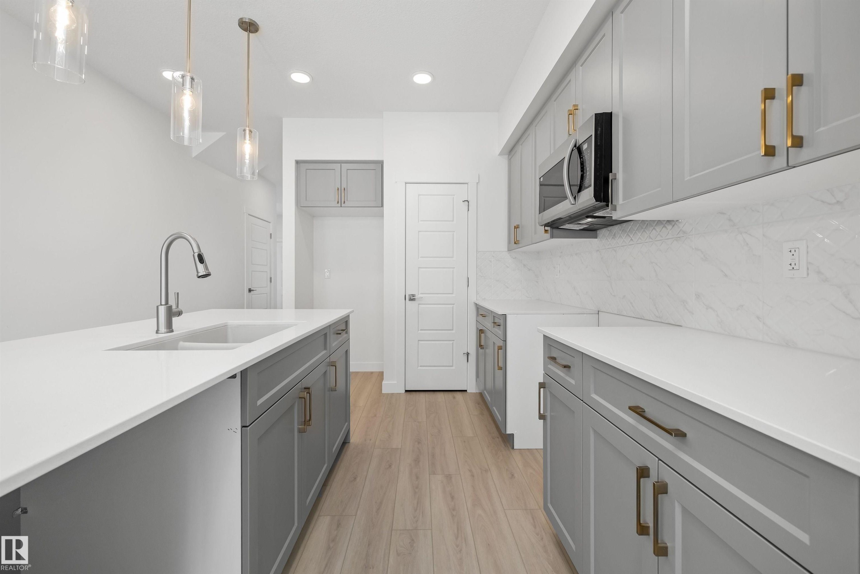 4592 Warbler Loop, Edmonton, AB - Indoor Photo Showing Kitchen With Double Sink With Upgraded Kitchen