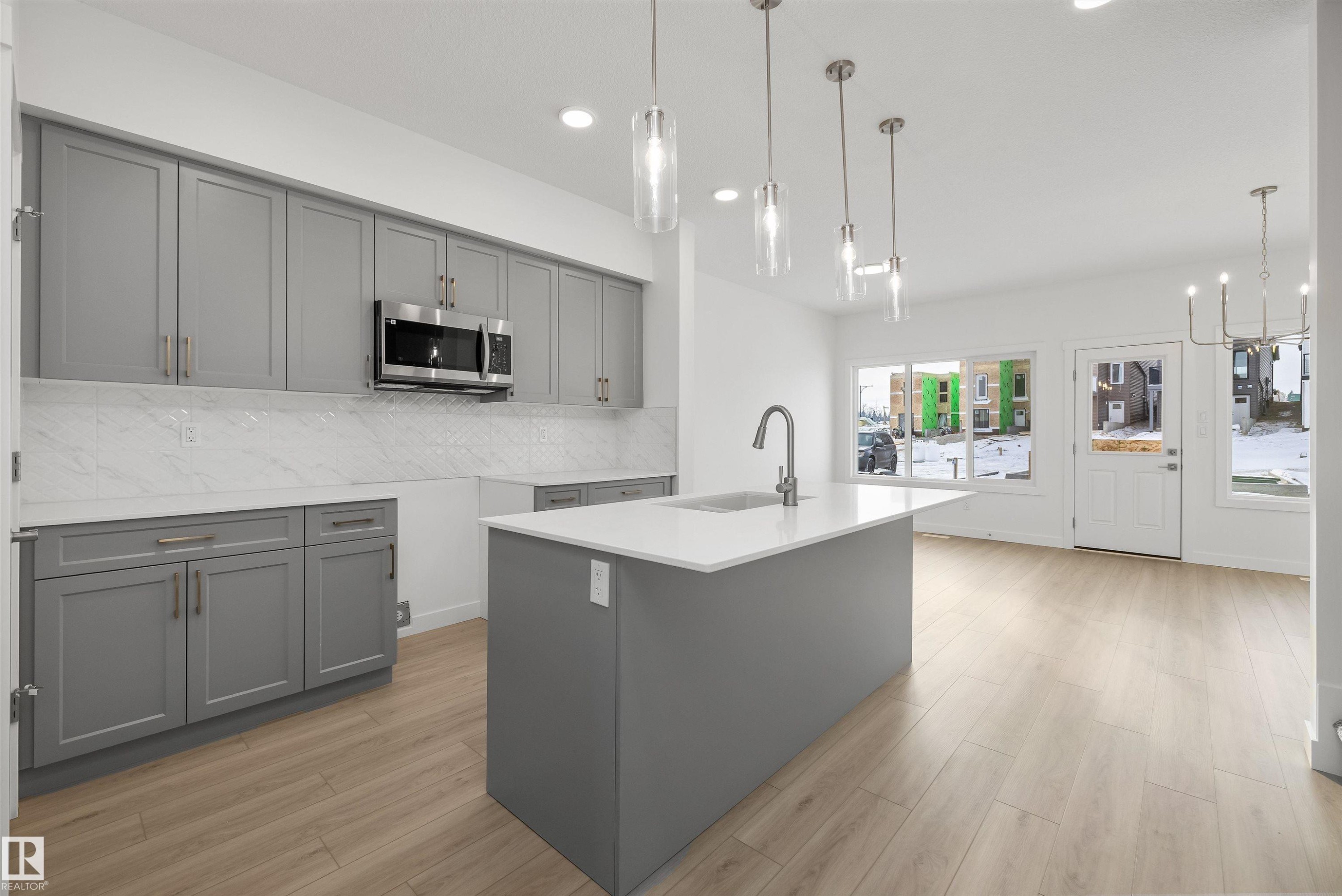 4592 Warbler Loop, Edmonton, AB - Indoor Photo Showing Kitchen With Upgraded Kitchen