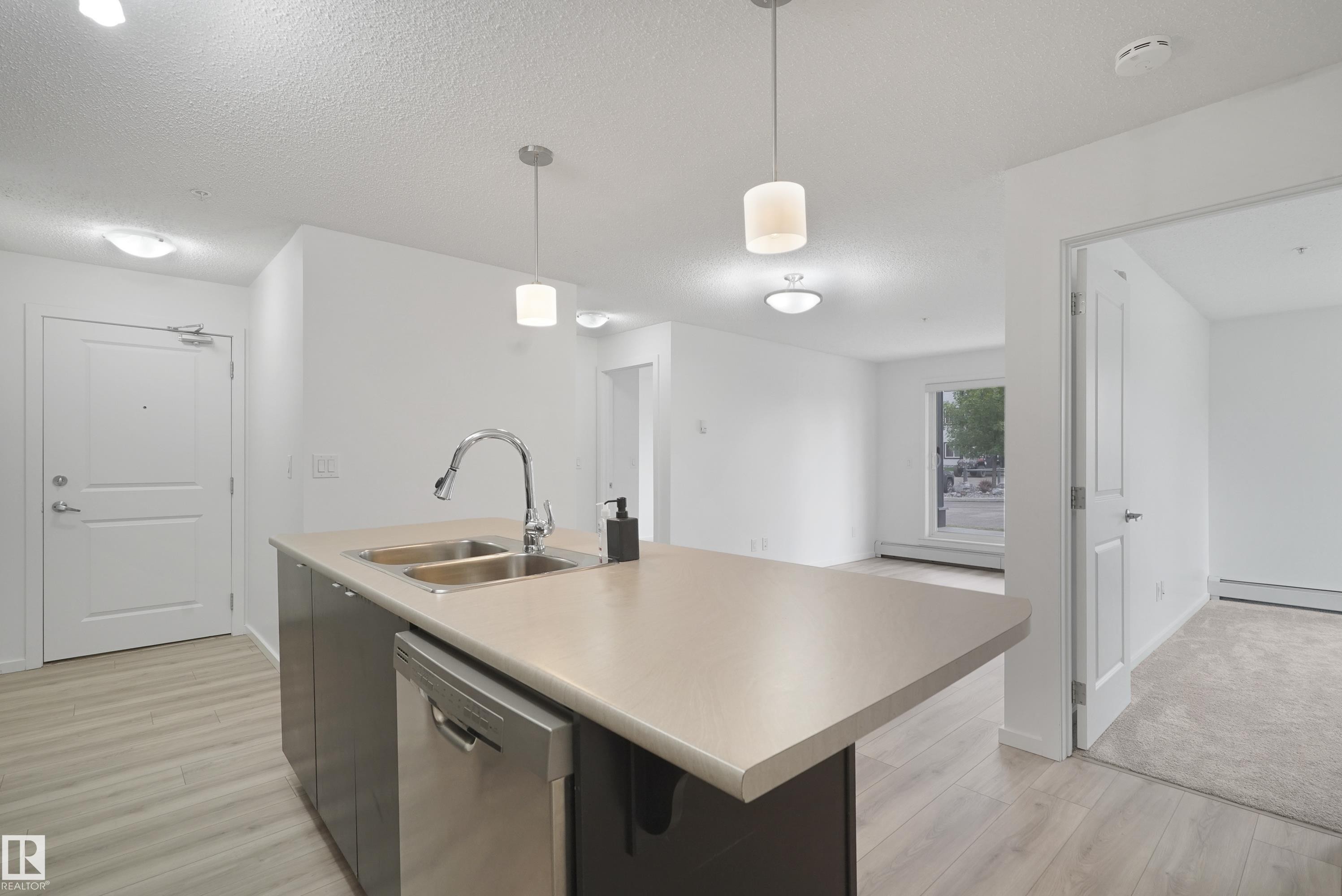 114 3357 16A Avenue, Edmonton, AB - Indoor Photo Showing Kitchen With Double Sink