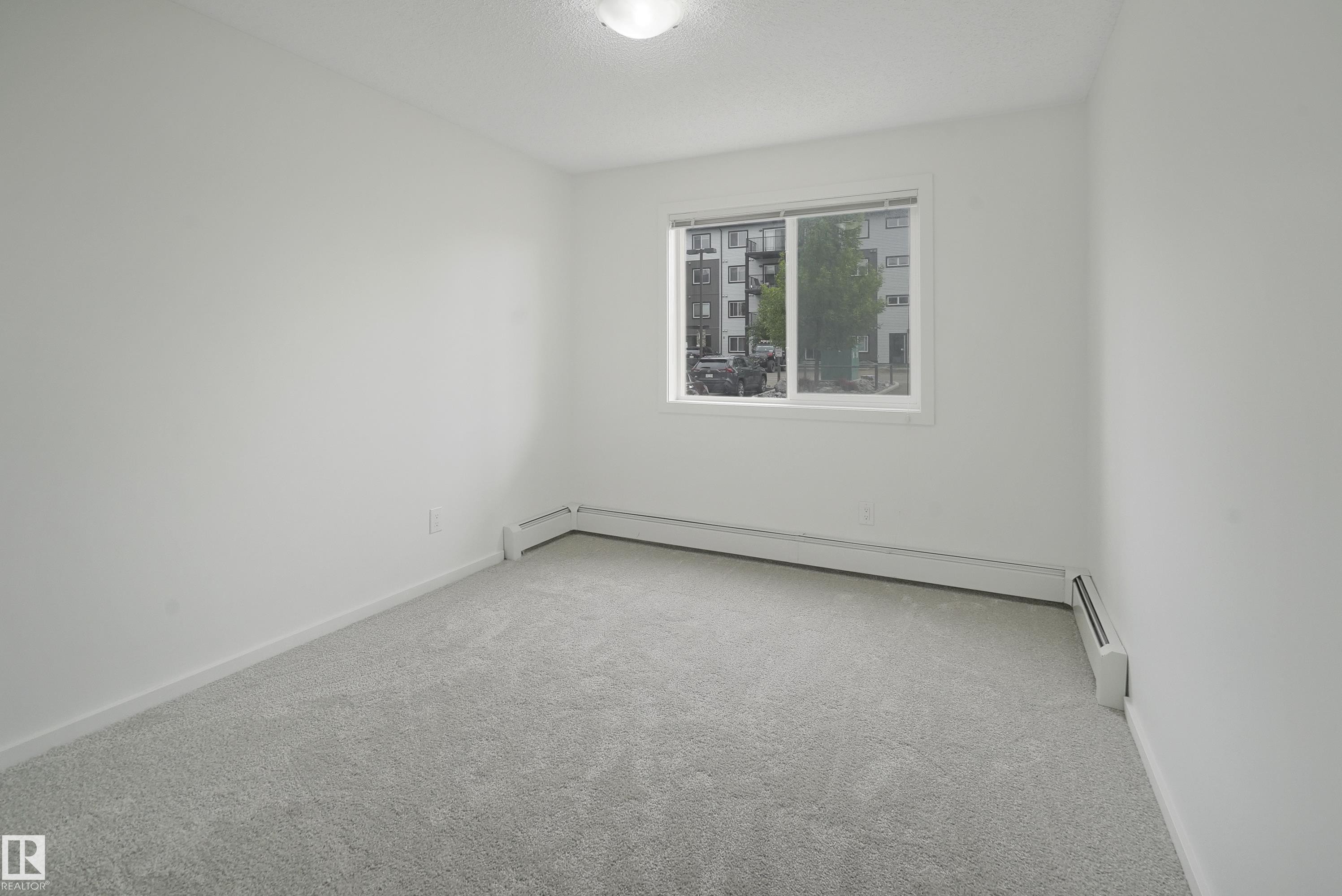 114 3357 16A Avenue, Edmonton, AB - Indoor Photo Showing Other Room