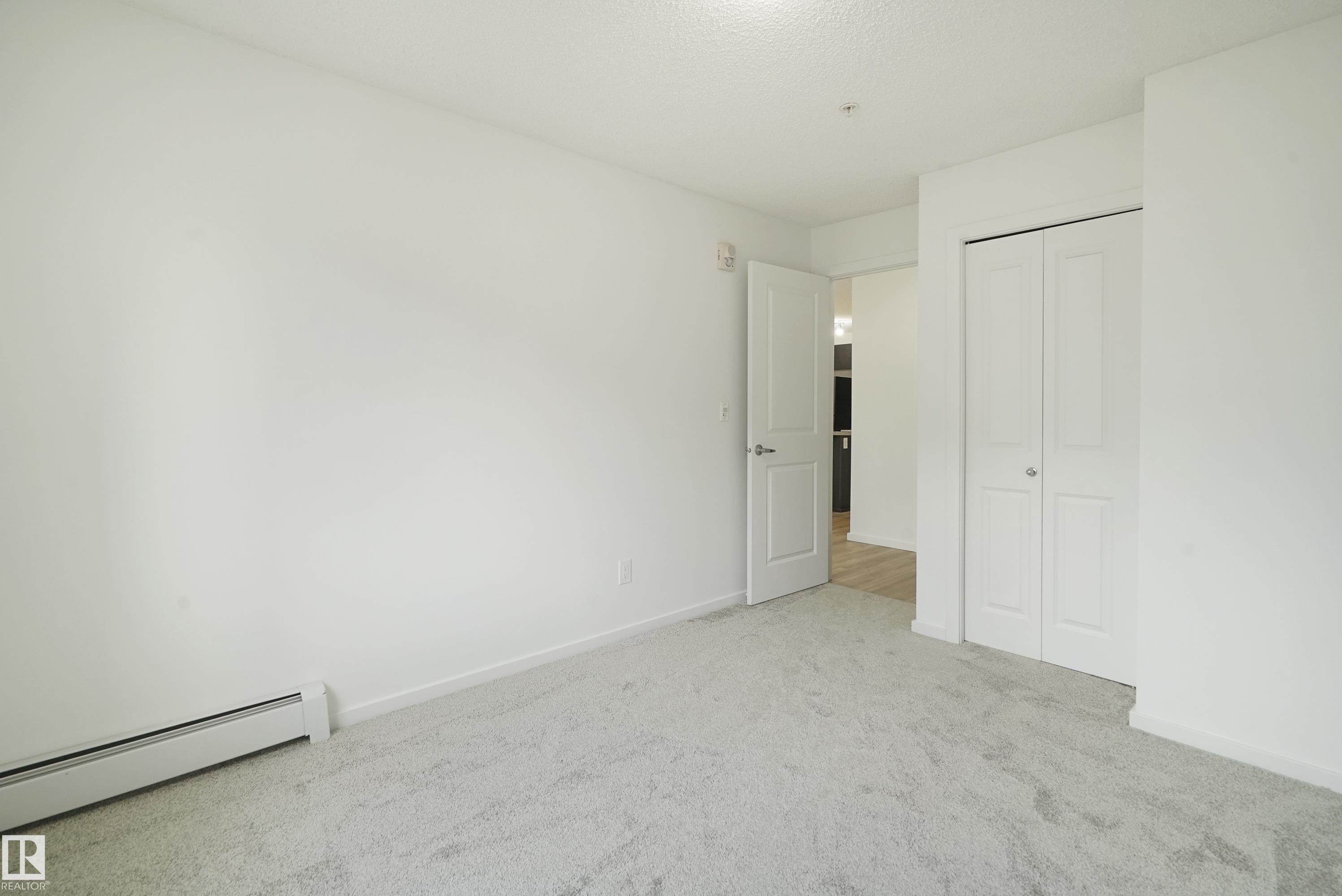 114 3357 16A Avenue, Edmonton, AB - Indoor Photo Showing Other Room
