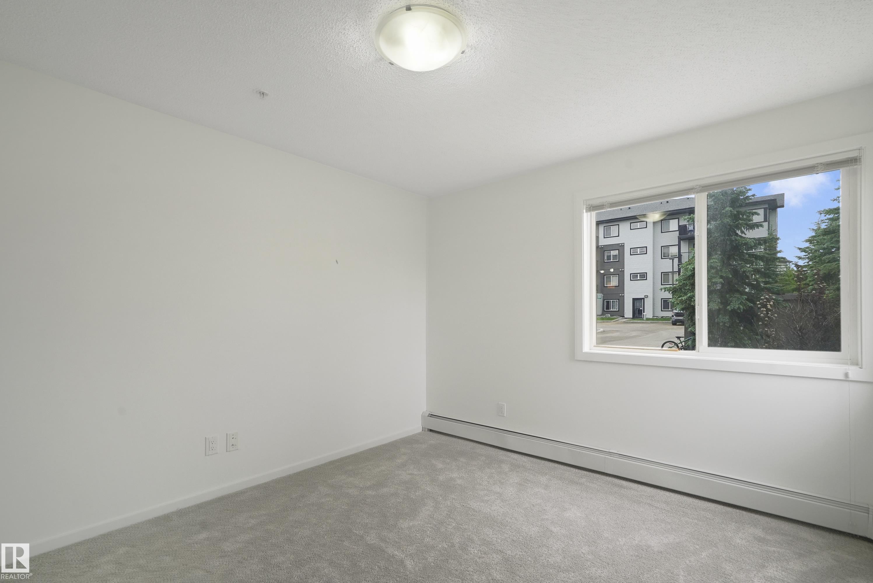 114 3357 16A Avenue, Edmonton, AB - Indoor Photo Showing Other Room