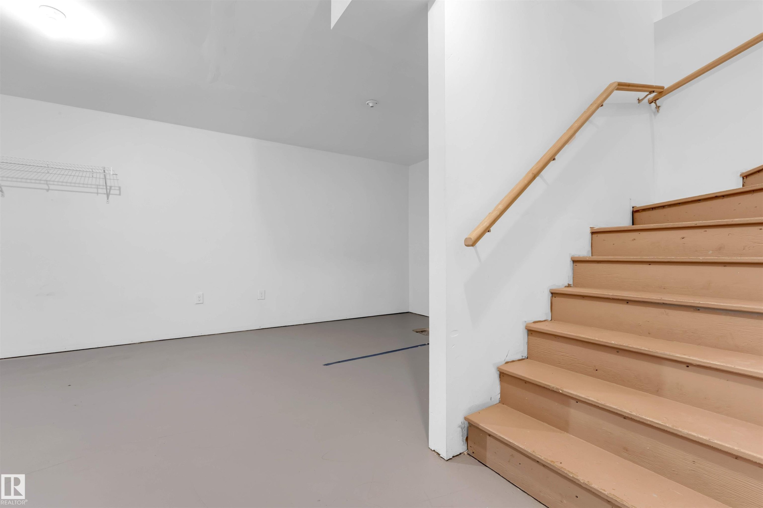 Stairs with concrete flooring - 610 Tamarack Road, Edmonton, AB - Indoor Photo Showing Other Room