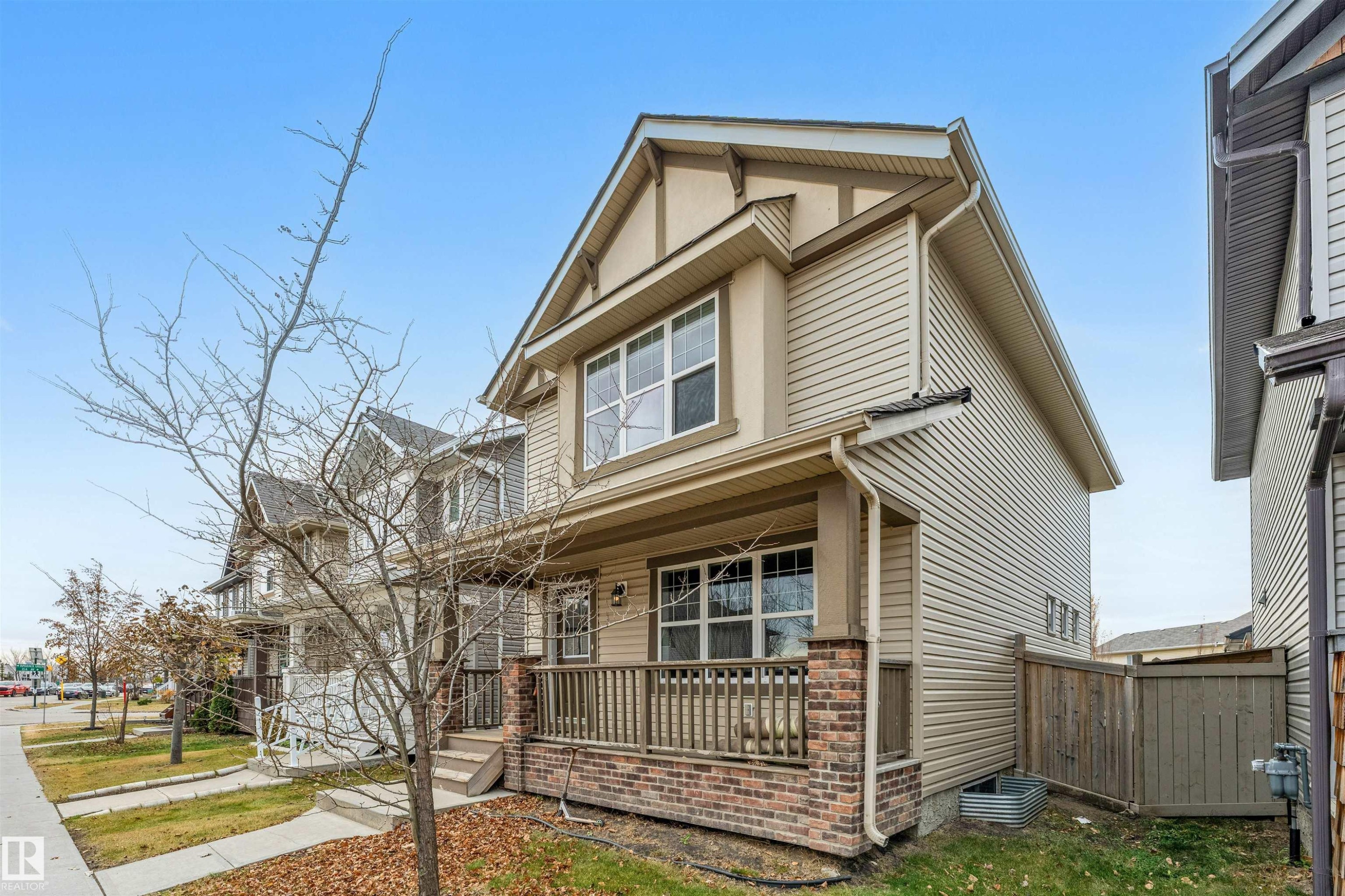 View of front of property with a porch - 610 Tamarack Road, Edmonton, AB - Outdoor With Deck Patio Veranda