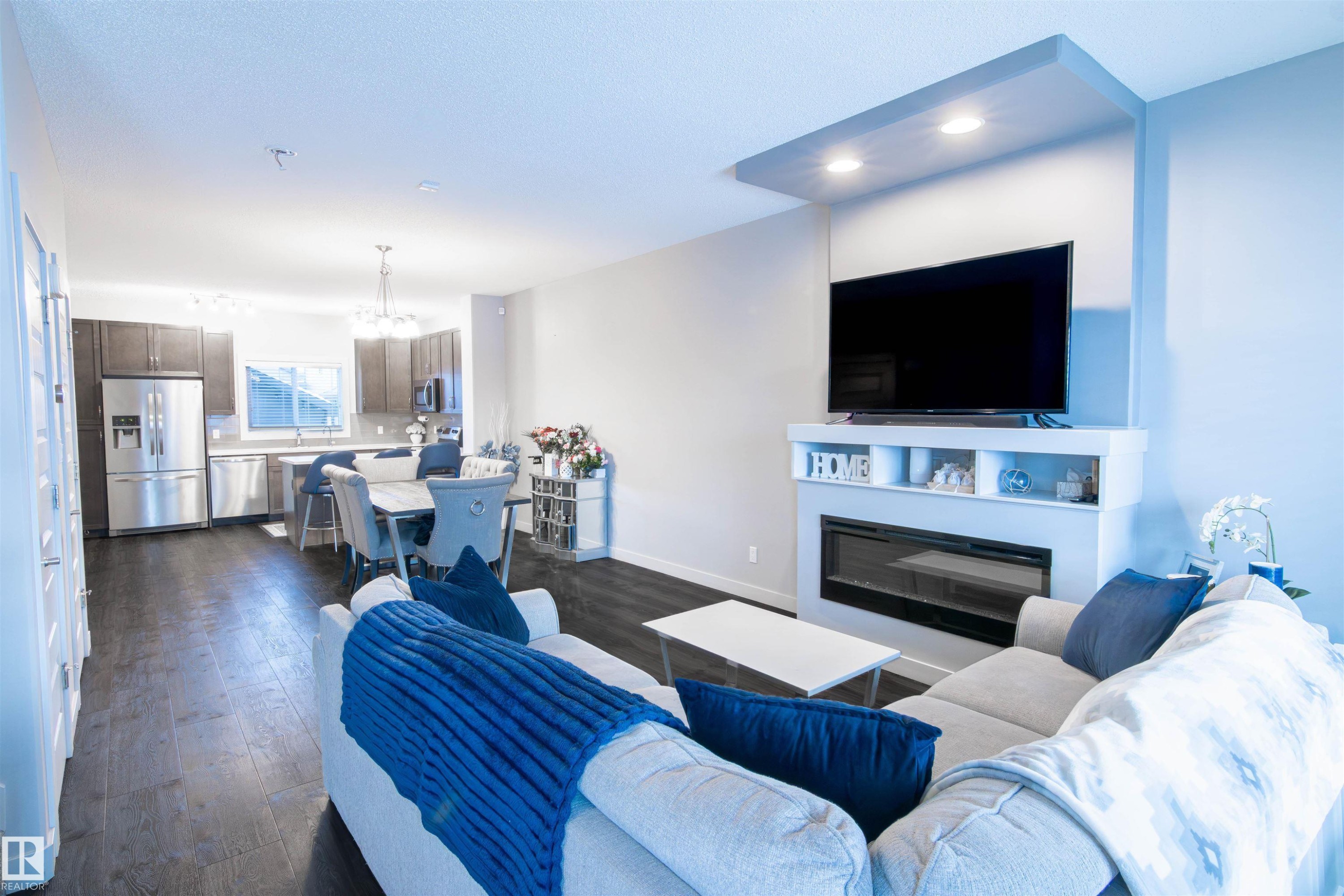 888 Cy Becker Drive, Edmonton, AB - Indoor Photo Showing Living Room With Fireplace
