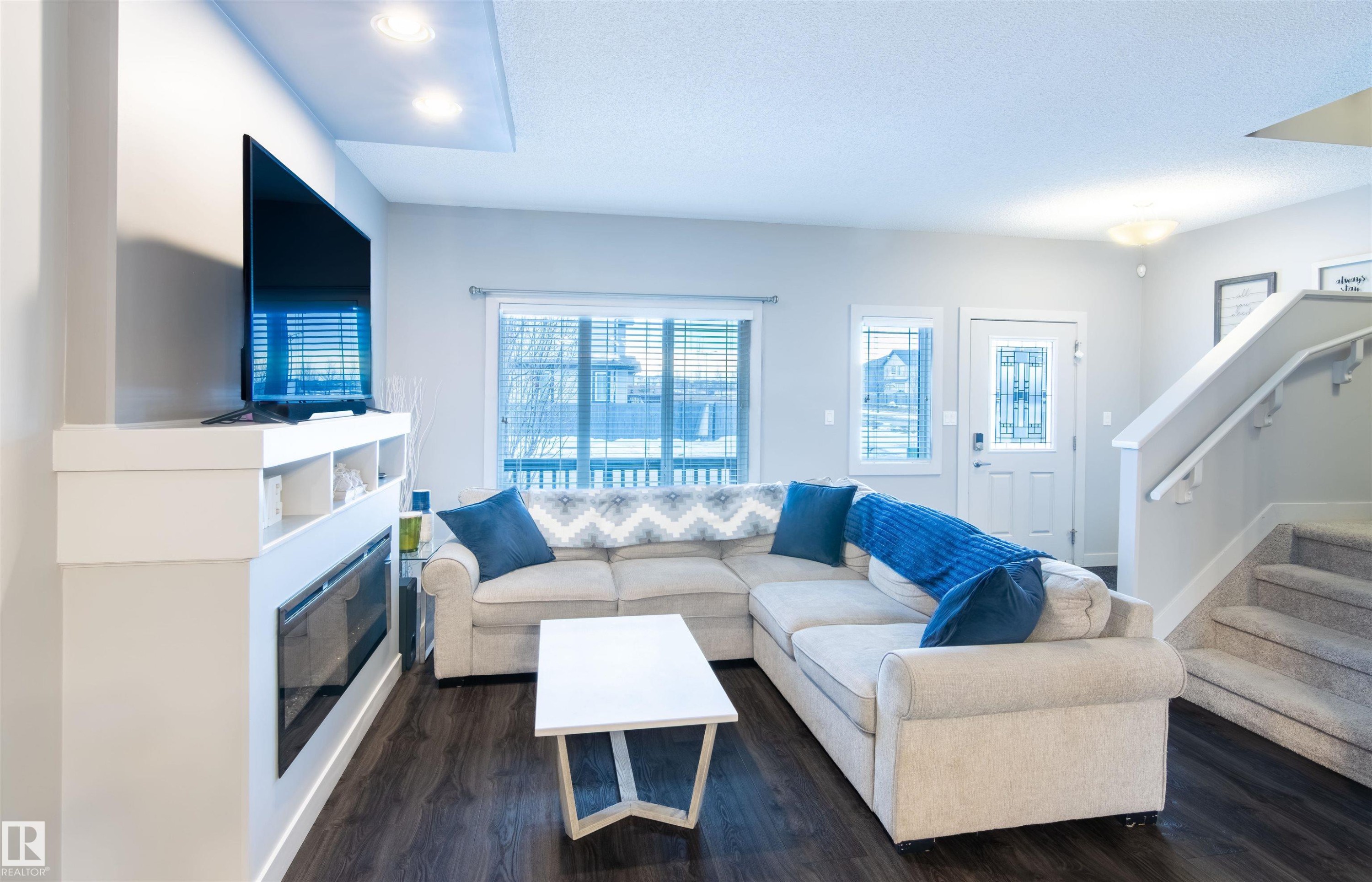 888 Cy Becker Drive, Edmonton, AB - Indoor Photo Showing Living Room With Fireplace