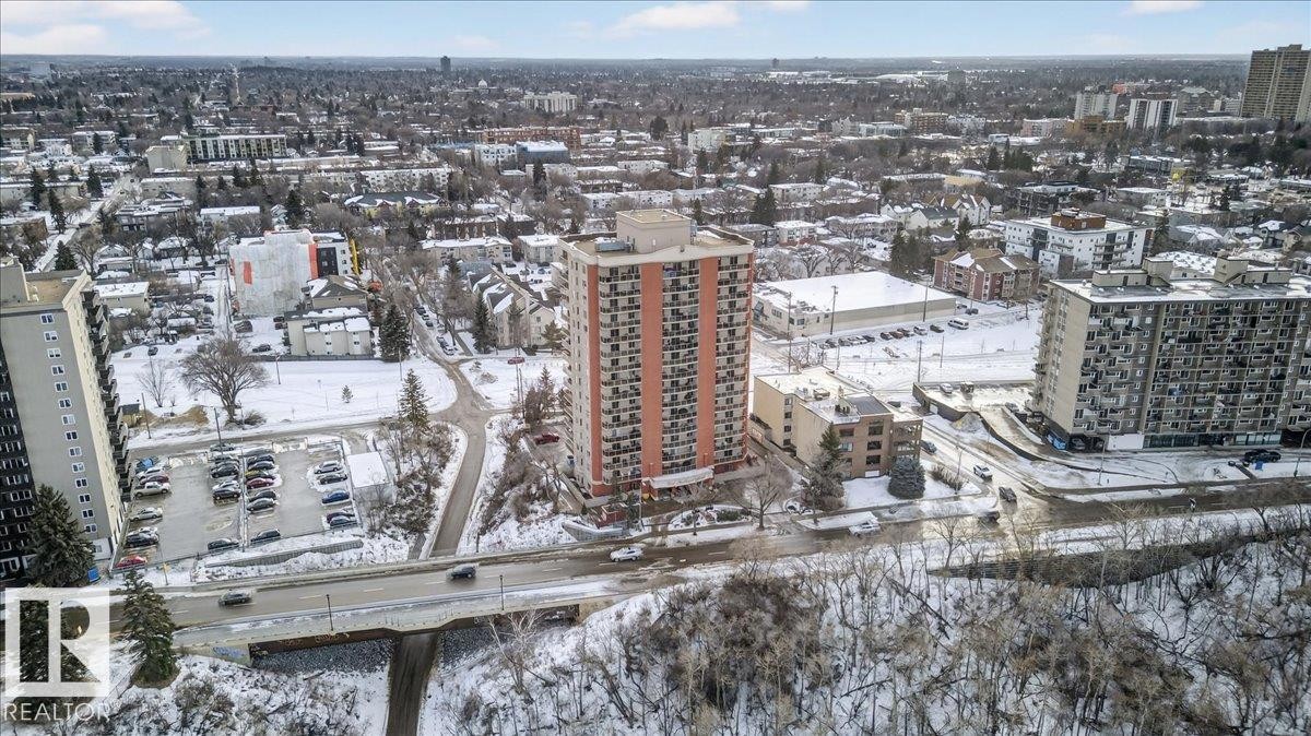 Snowy aerial view featuring a view of city - 402 10649 Saskatchewan Drive, Edmonton, AB - Outdoor With View
