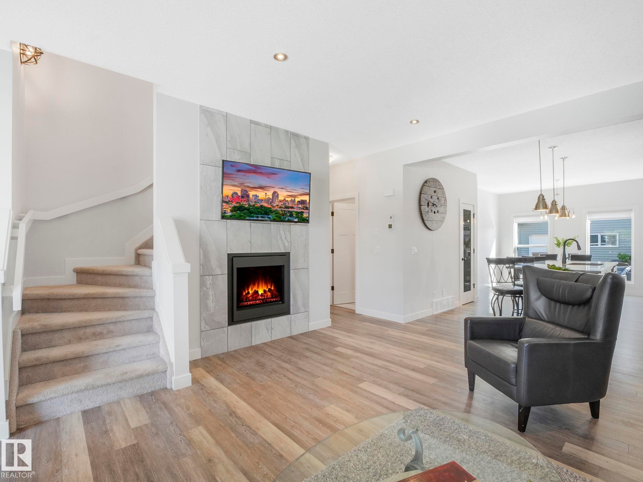6693 Cardinal Road, Edmonton, AB - Indoor Photo Showing Living Room With Fireplace