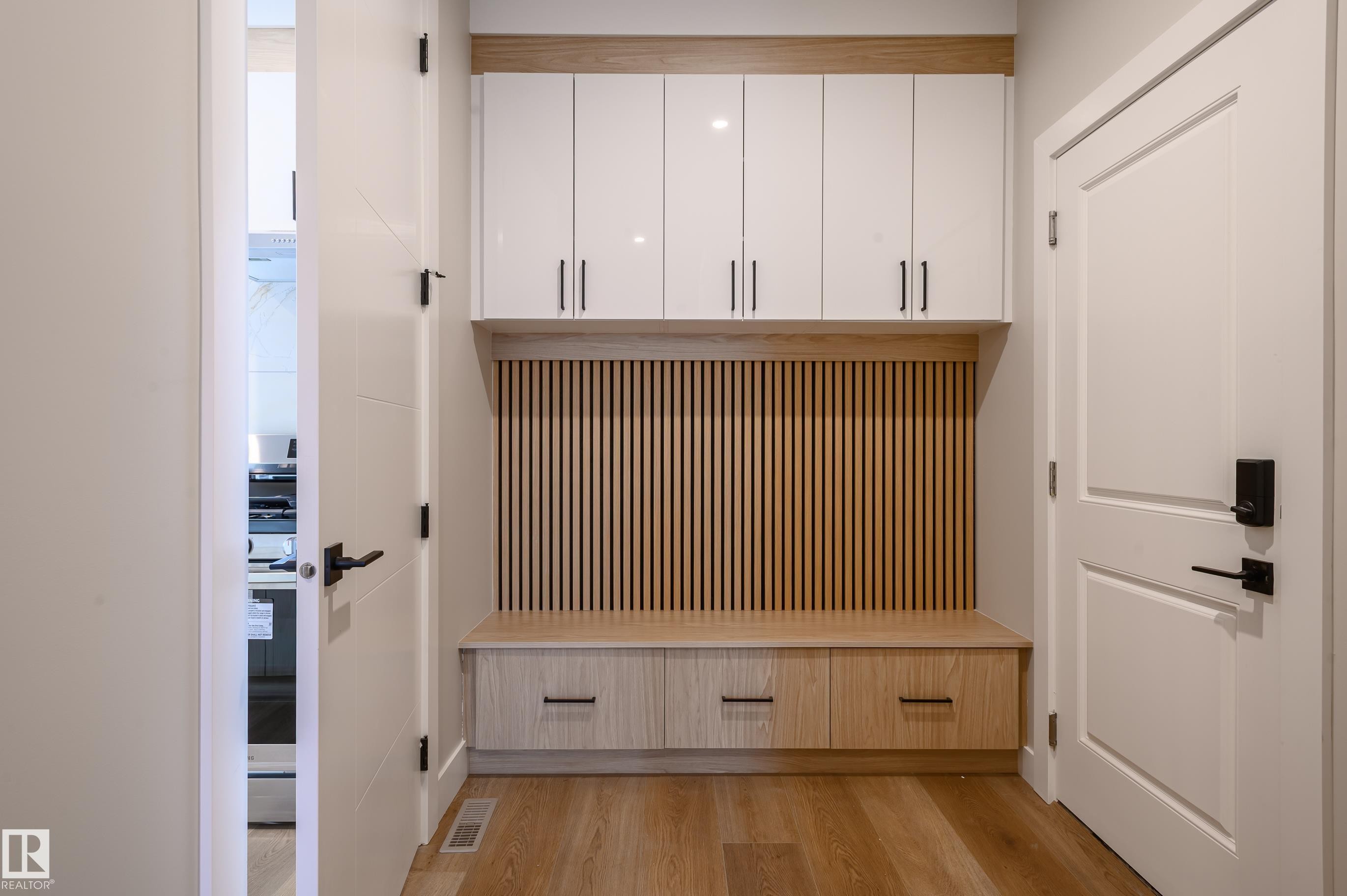 Mudroom with light wood-style floors - 16 Middleton Close, Leduc, AB - Indoor Photo Showing Other Room