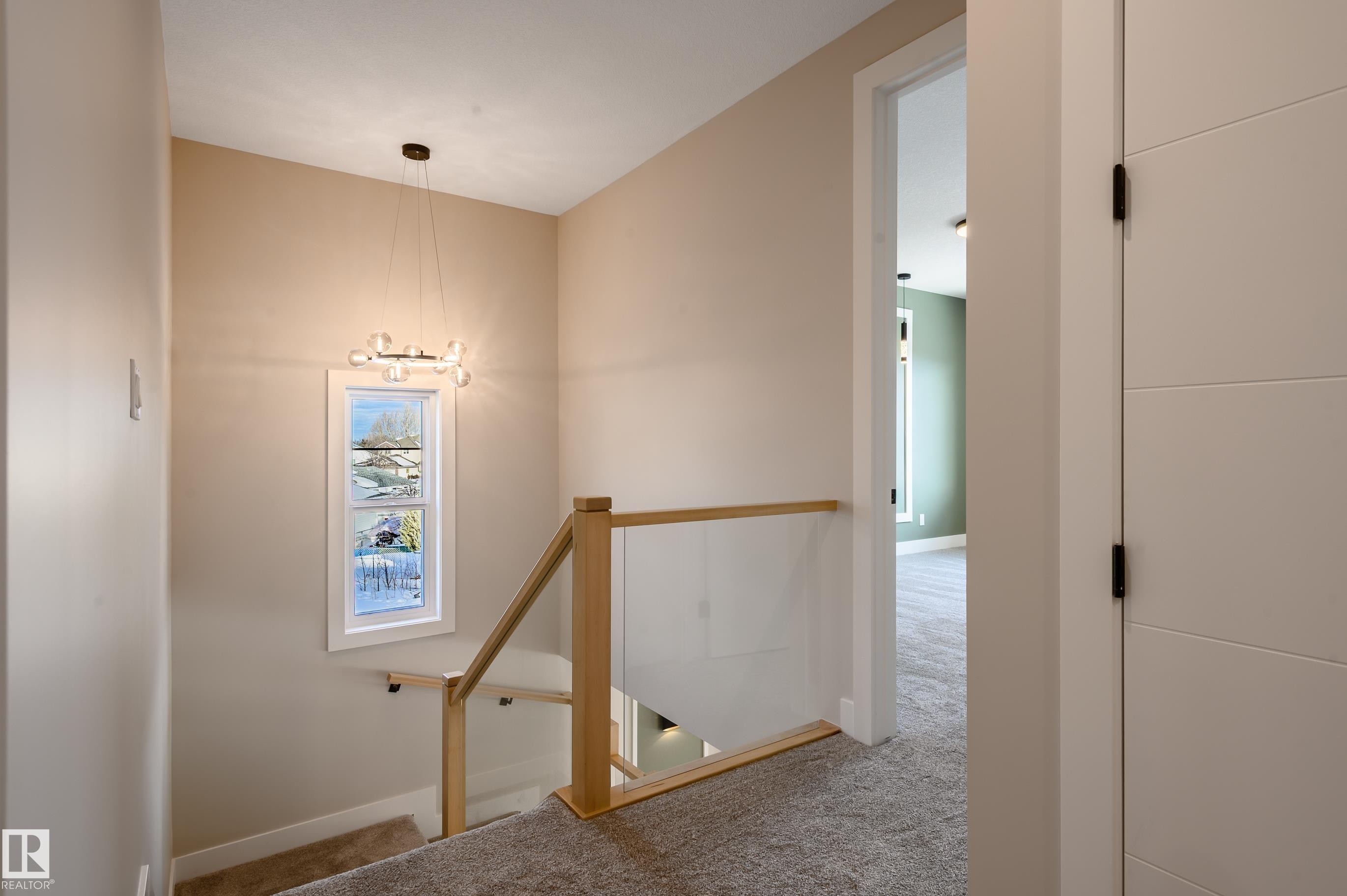 Stairs featuring carpet flooring and baseboards - 16 Middleton Close, Leduc, AB - Indoor Photo Showing Other Room