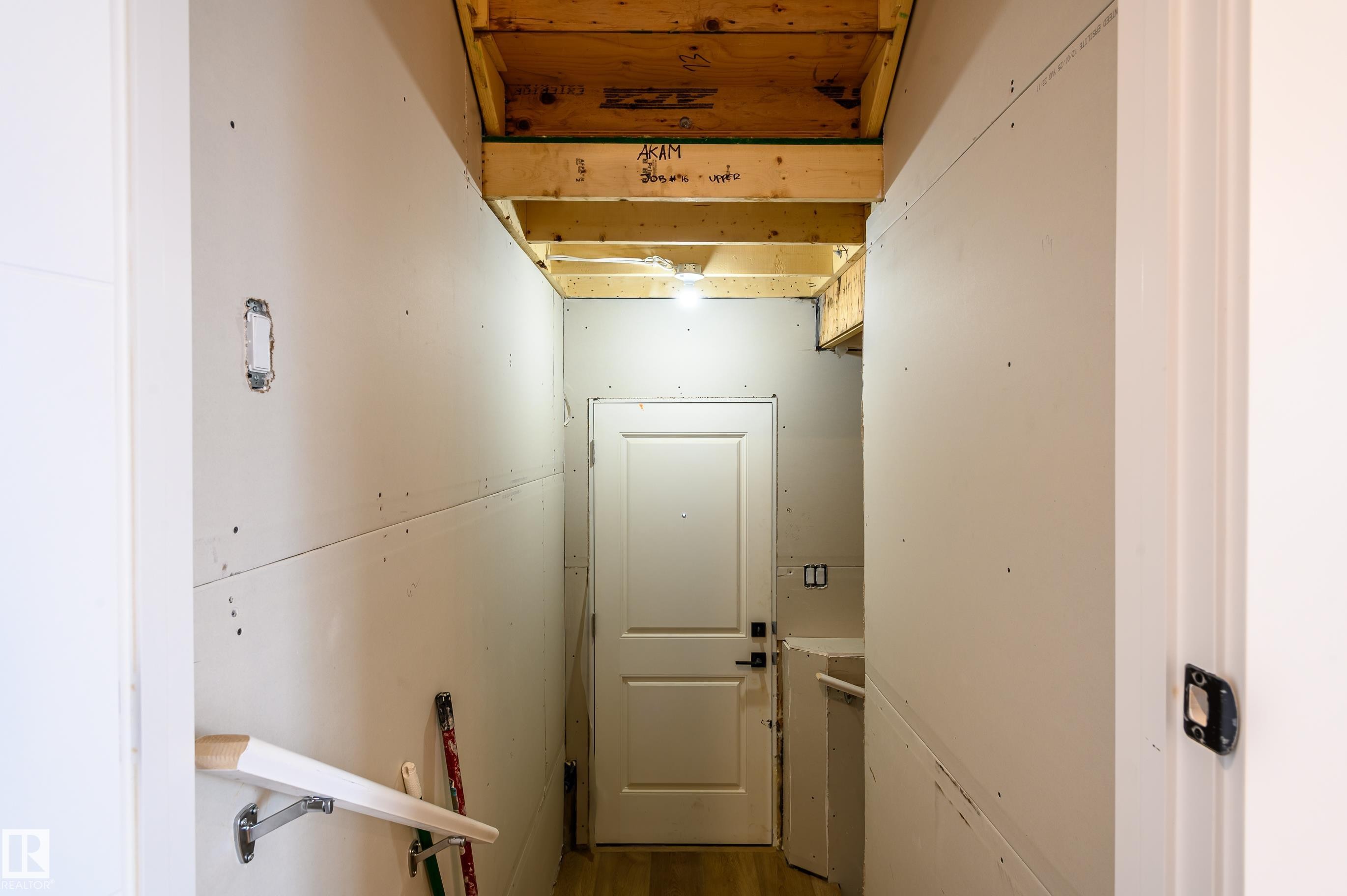 Corridor with wood finished floors - 16 Middleton Close, Leduc, AB - Indoor