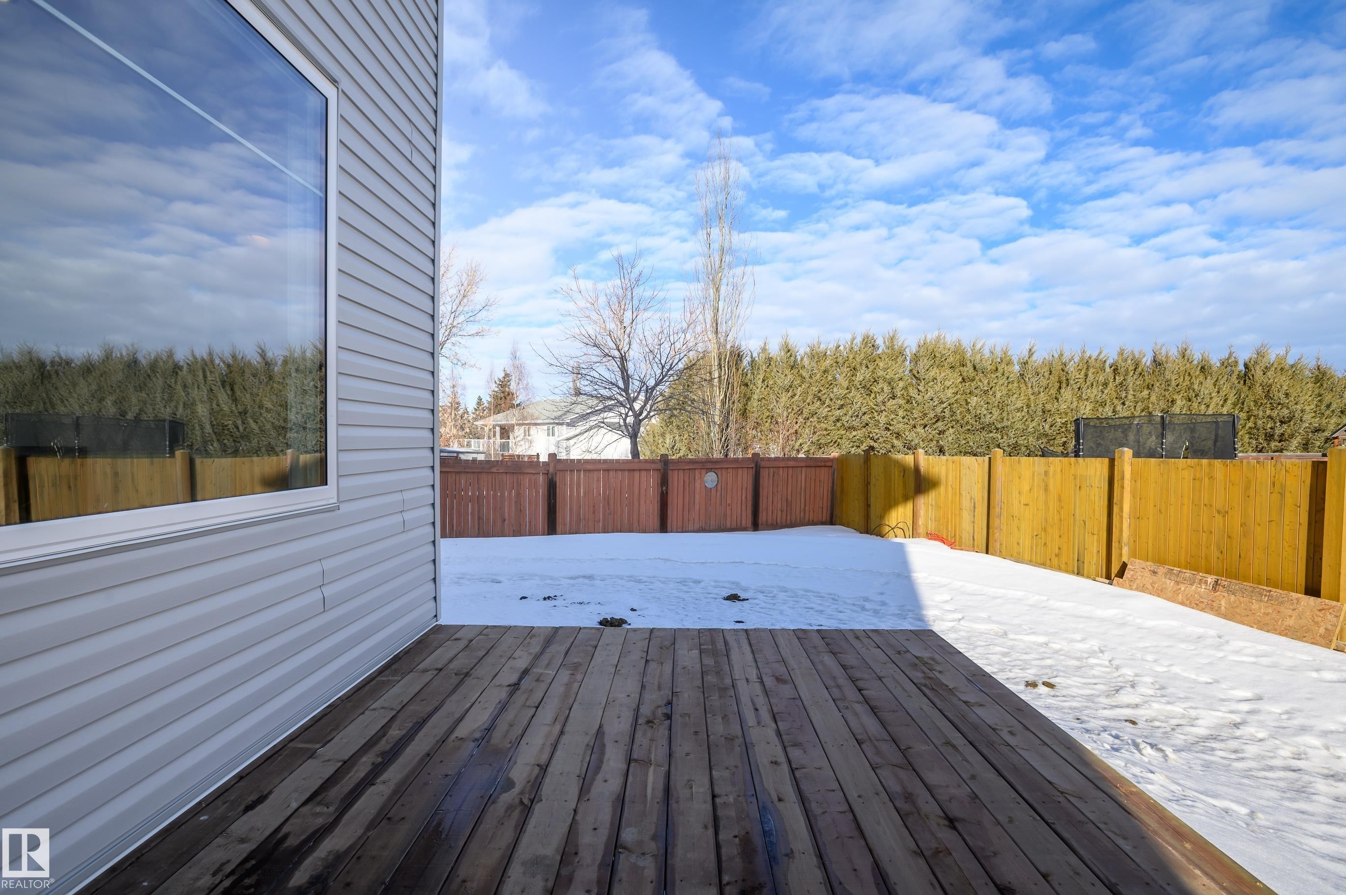 Patio with a fenced backyard - 16 Middleton Close, Leduc, AB - Outdoor With Deck Patio Veranda