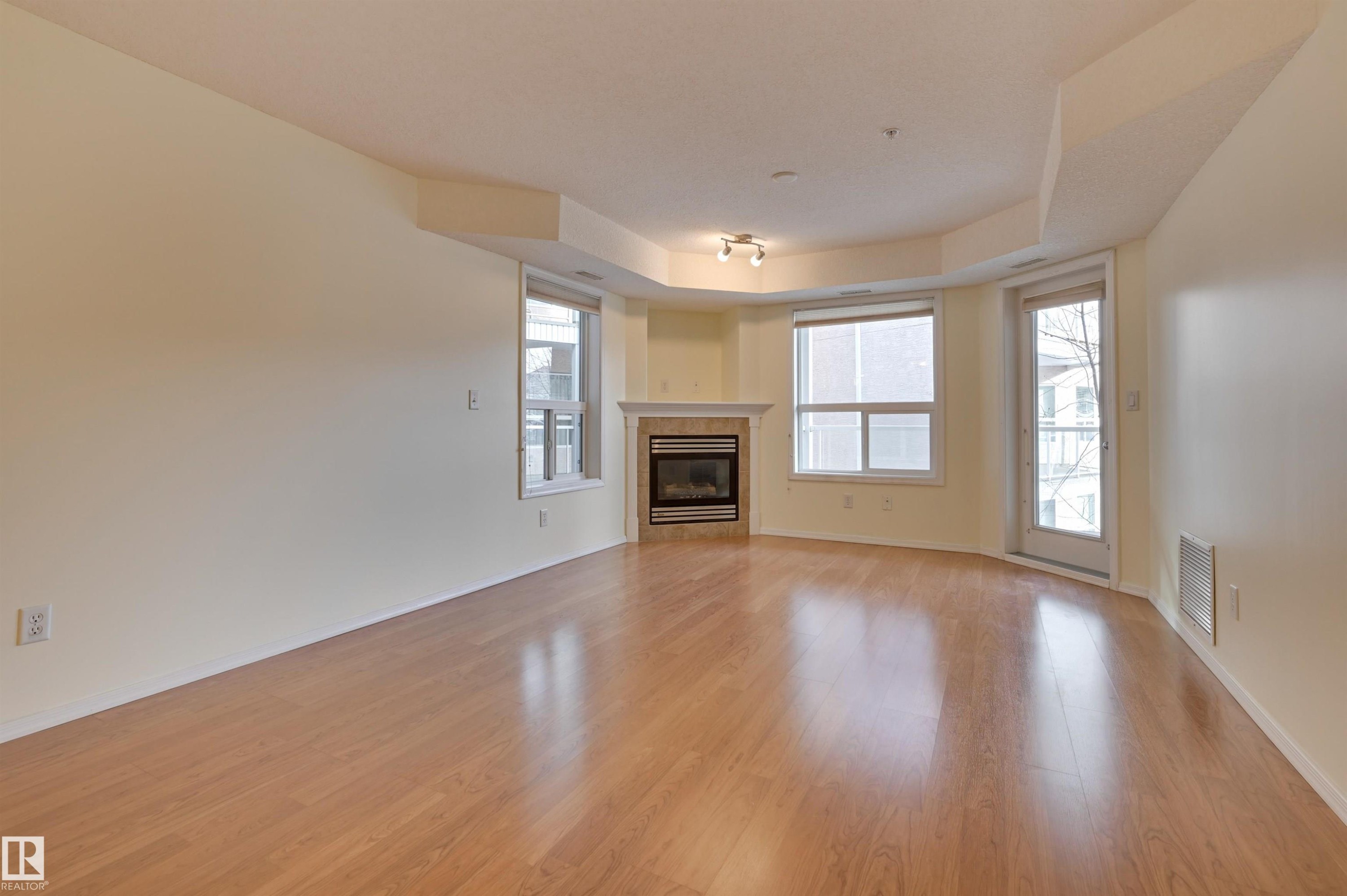 336 9008 99 Avenue, Edmonton, AB - Indoor Photo Showing Other Room With Fireplace