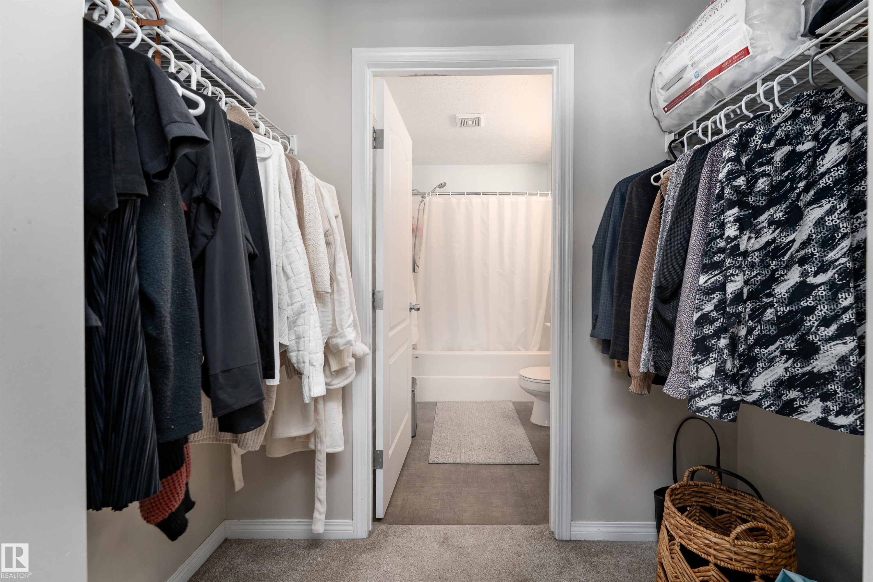 Walk in closet with light colored carpet - 325 1520 Hammond Gate, Edmonton, AB - Indoor With Storage