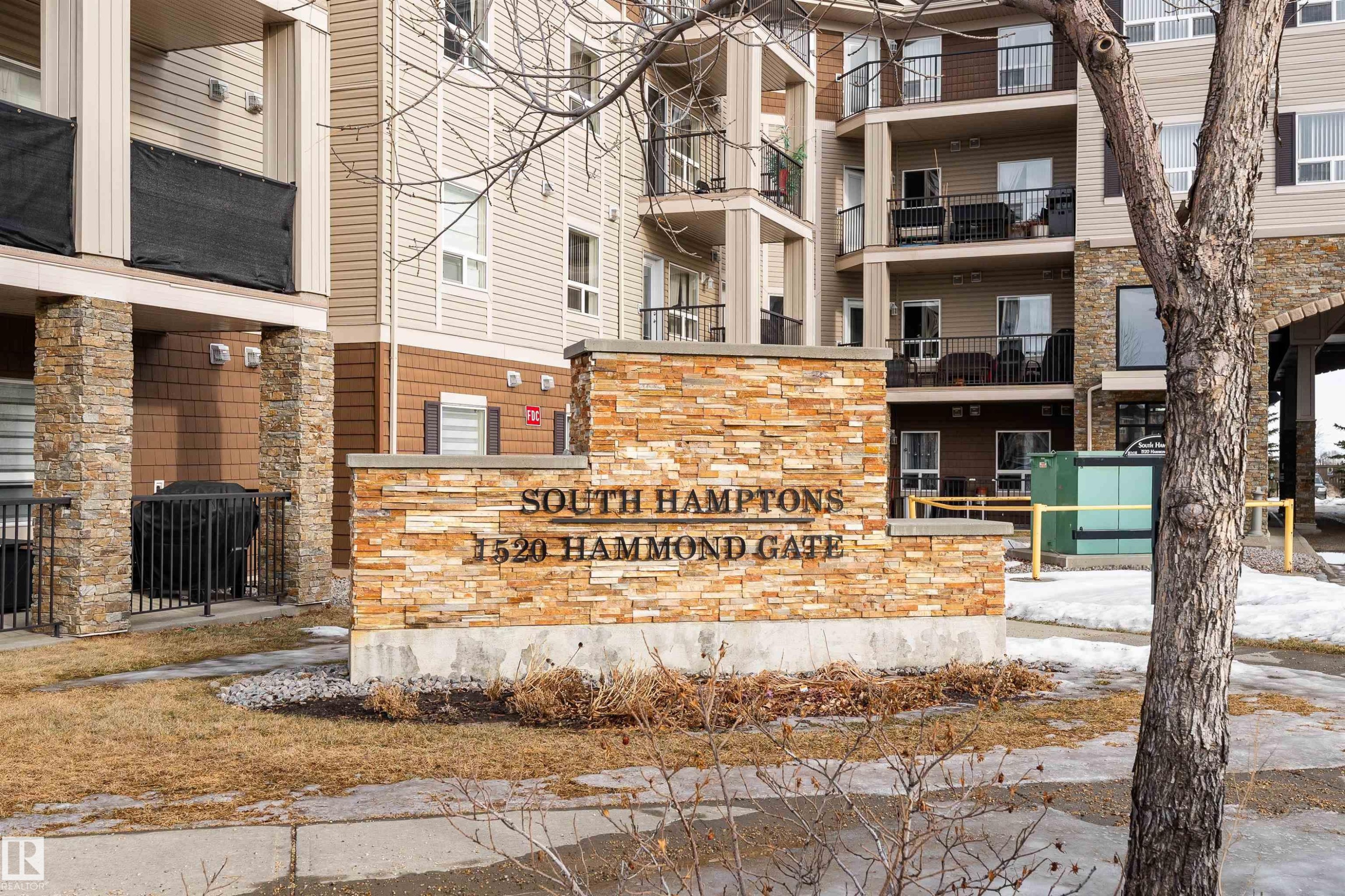 View of community sign - 325 1520 Hammond Gate, Edmonton, AB - Outdoor With Balcony With Facade