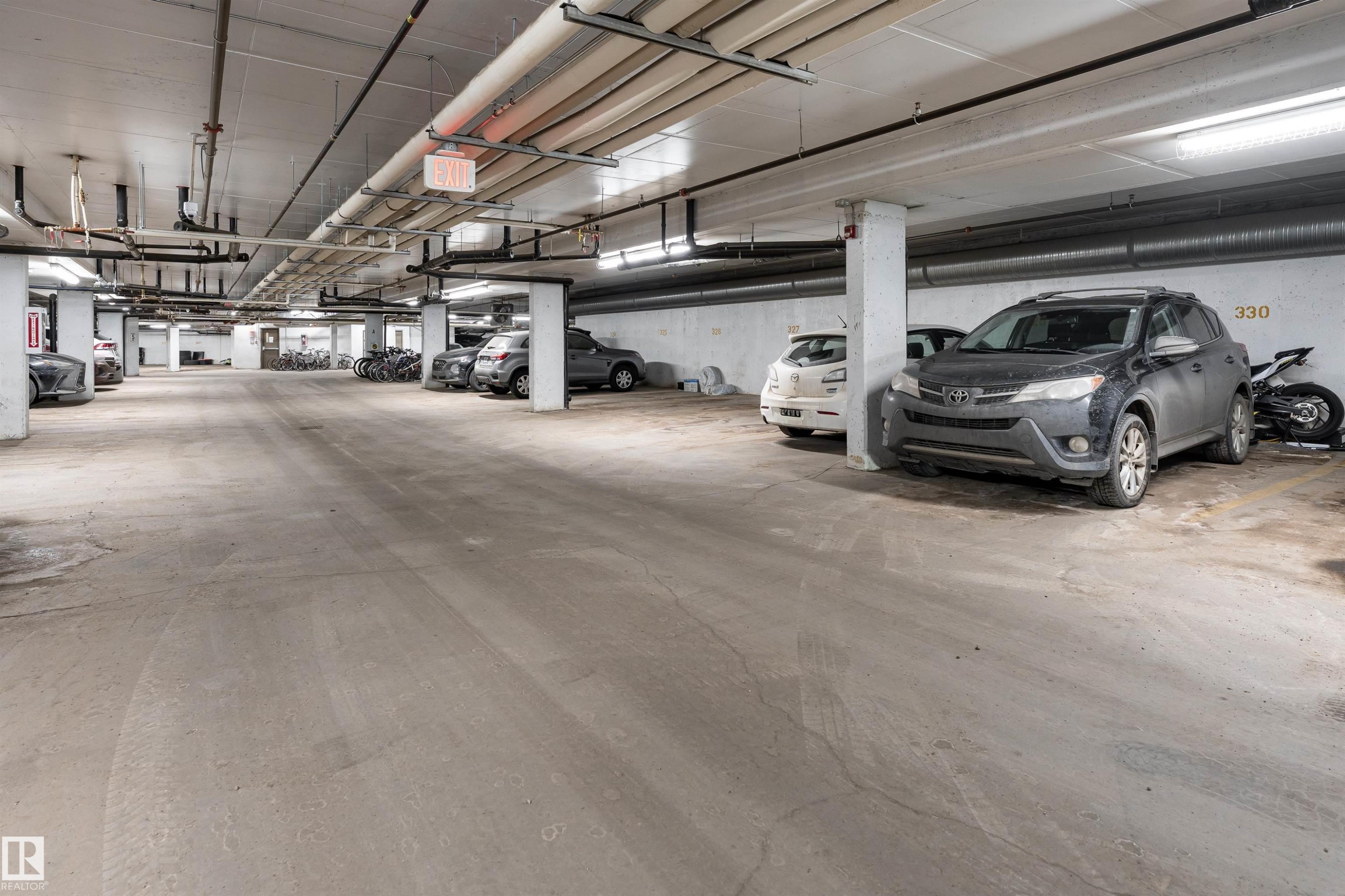 View of parking garage - 325 1520 Hammond Gate, Edmonton, AB - Indoor Photo Showing Garage