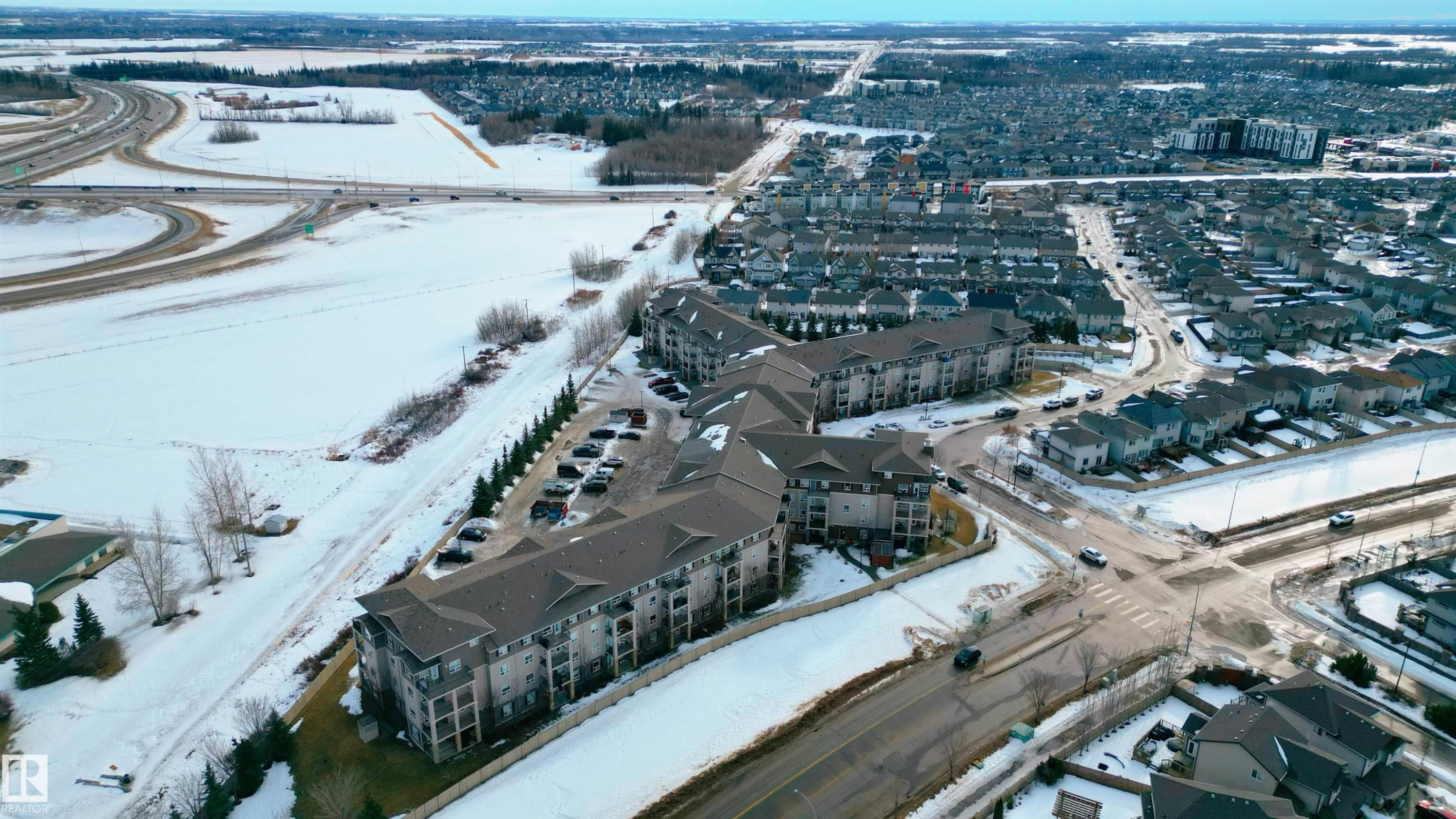 View of snowy aerial view - 325 1520 Hammond Gate, Edmonton, AB - Outdoor With View