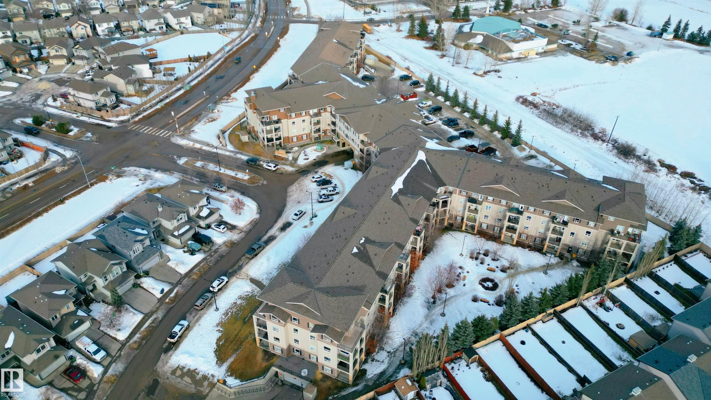 Snowy aerial view featuring a residential view - 325 1520 Hammond Gate, Edmonton, AB - Other