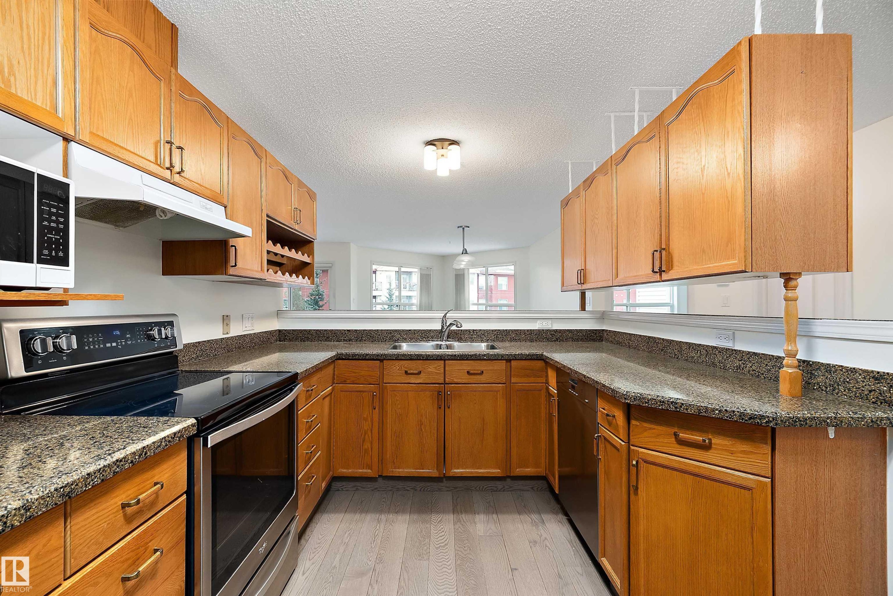 409 10221 111 Street, Edmonton, AB - Indoor Photo Showing Kitchen With Double Sink