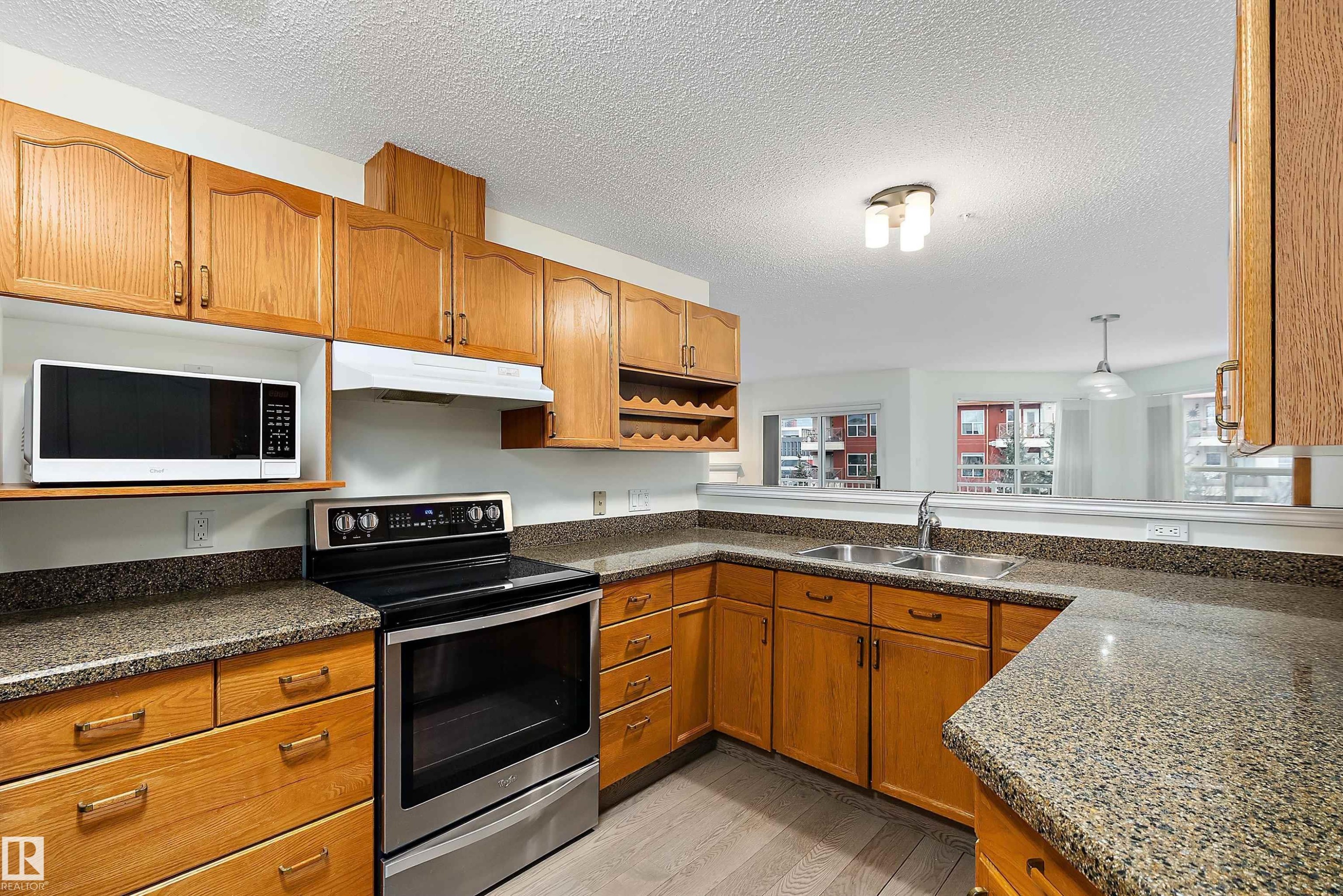 409 10221 111 Street, Edmonton, AB - Indoor Photo Showing Kitchen With Double Sink
