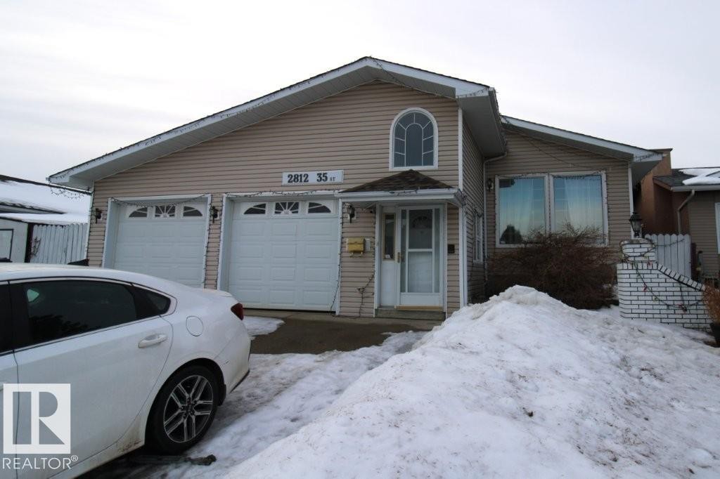 View of front of house featuring a garage - 2812 35 Street Nw, Edmonton, AB - Outdoor