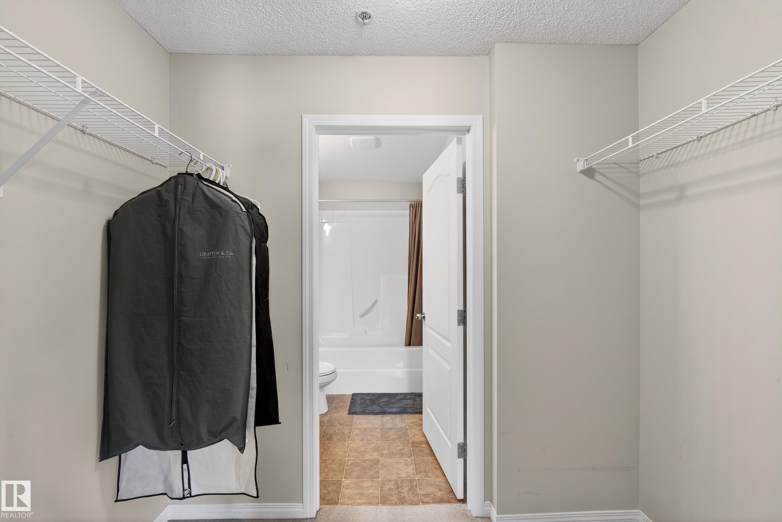 View of walk in closet - 131 1520 Hammond Gate, Edmonton, AB - Indoor