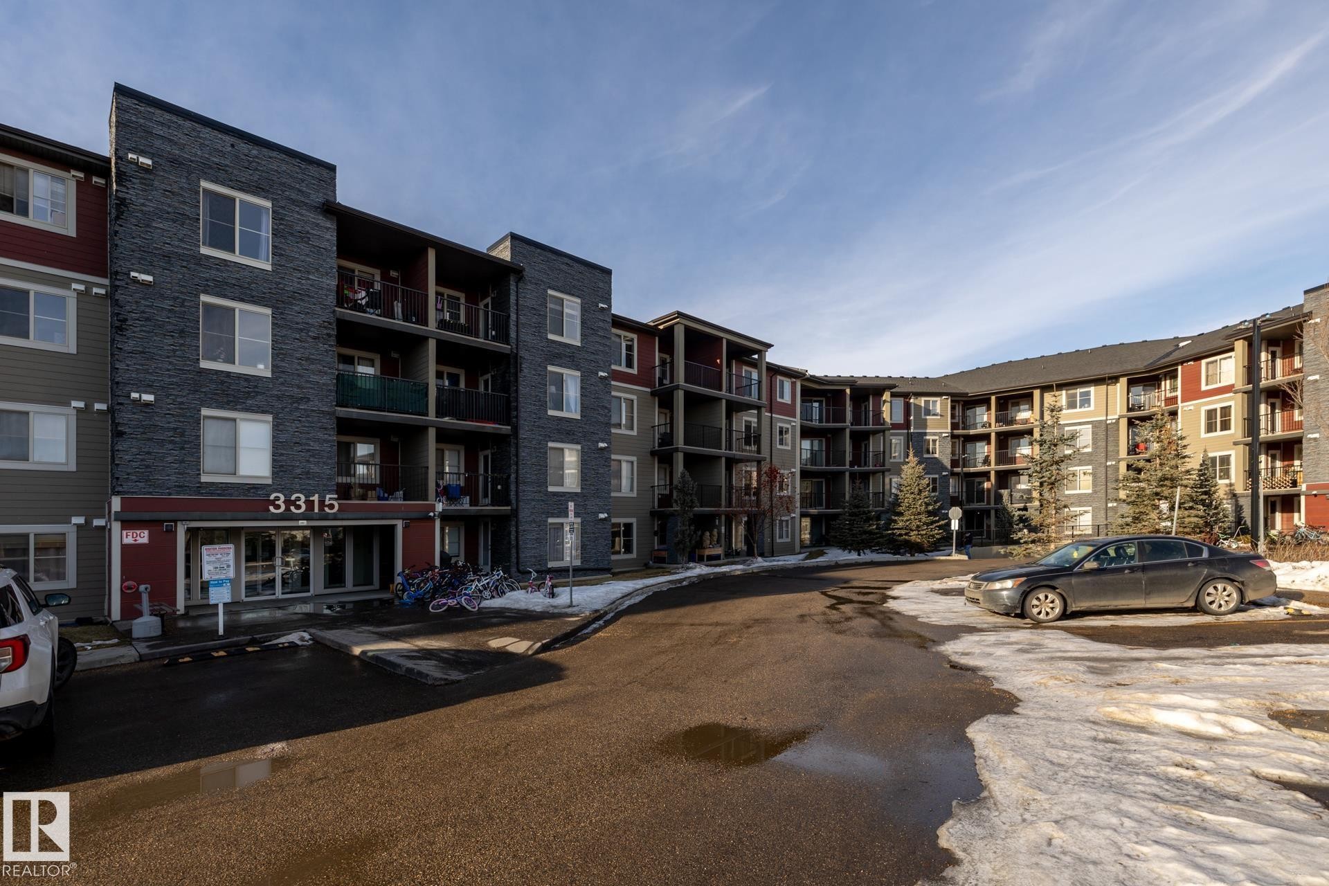 View of apartment building / complex - 433 3315 James Mowatt Trail, Edmonton, AB - Outdoor With Balcony With Facade