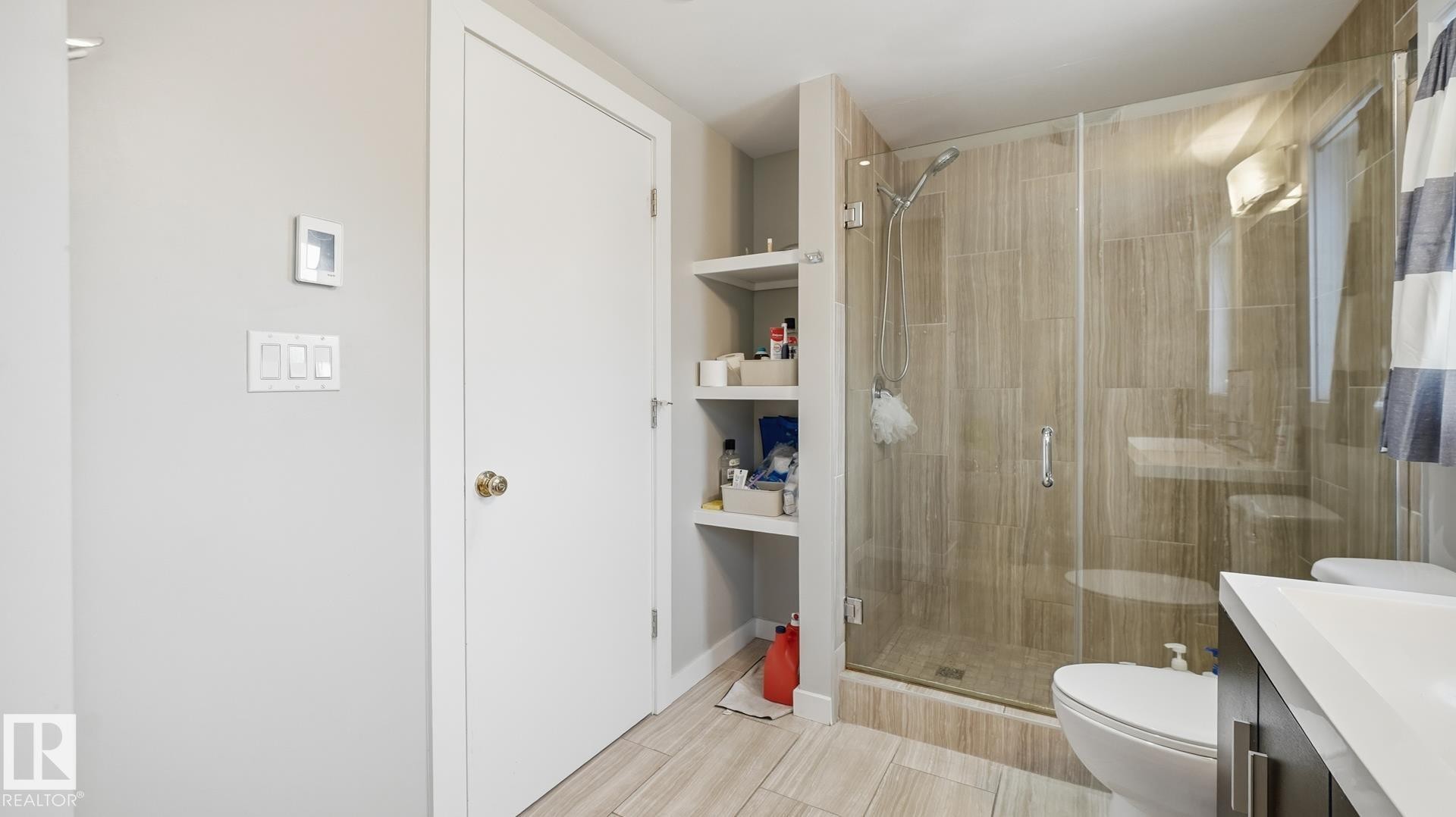Bathroom with vanity and a stall shower - 11520 78 Avenue Nw, Edmonton, AB - Indoor Photo Showing Bathroom
