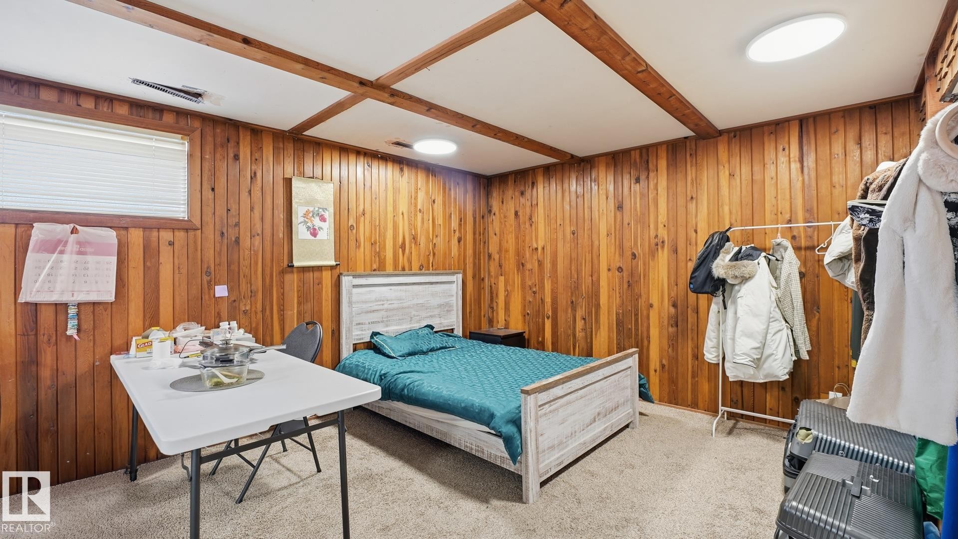 Bedroom with carpet flooring and wood walls - 11520 78 Avenue Nw, Edmonton, AB - Indoor Photo Showing Other Room