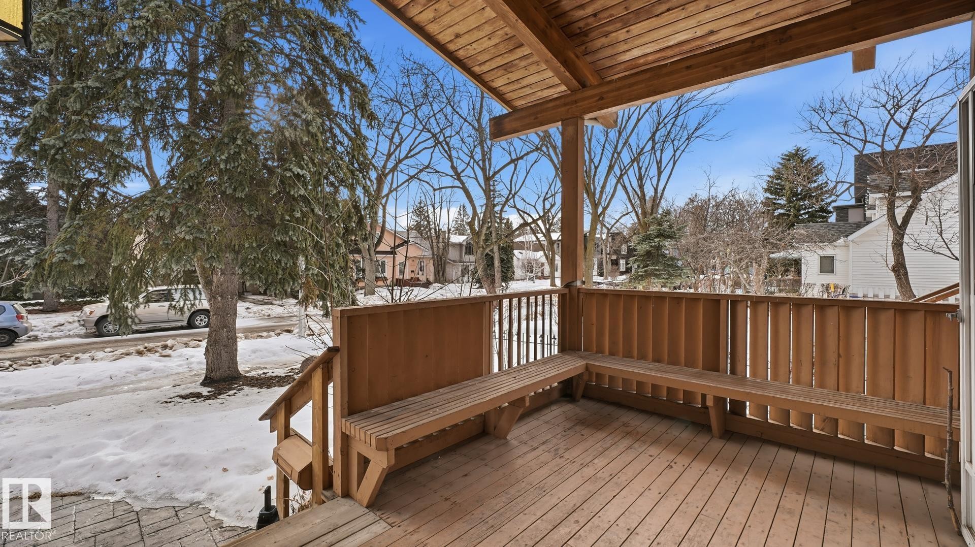 Snow covered deck featuring a residential view - 11520 78 Avenue Nw, Edmonton, AB - Outdoor With Deck Patio Veranda With Exterior