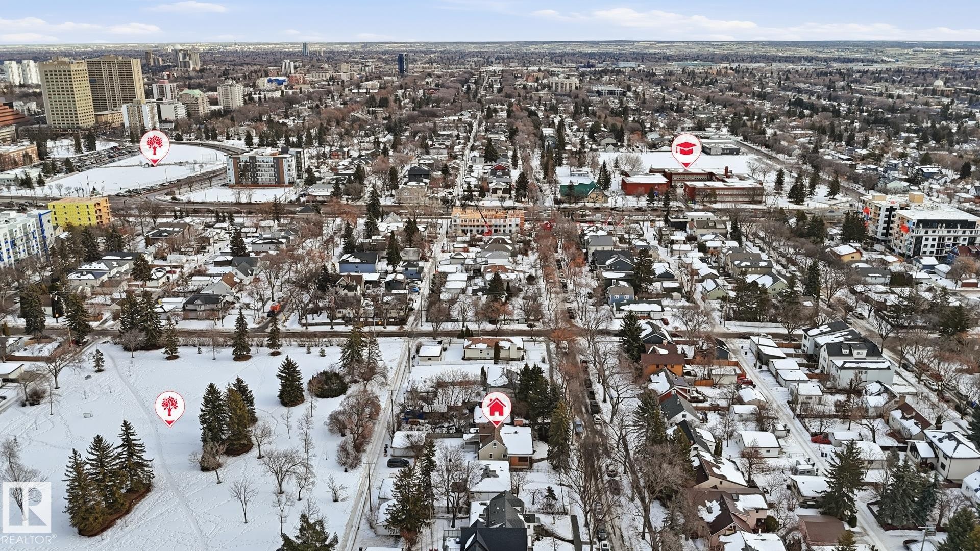 Snowy aerial view with a view of city and a residential view - 11520 78 Avenue Nw, Edmonton, AB - Outdoor With View