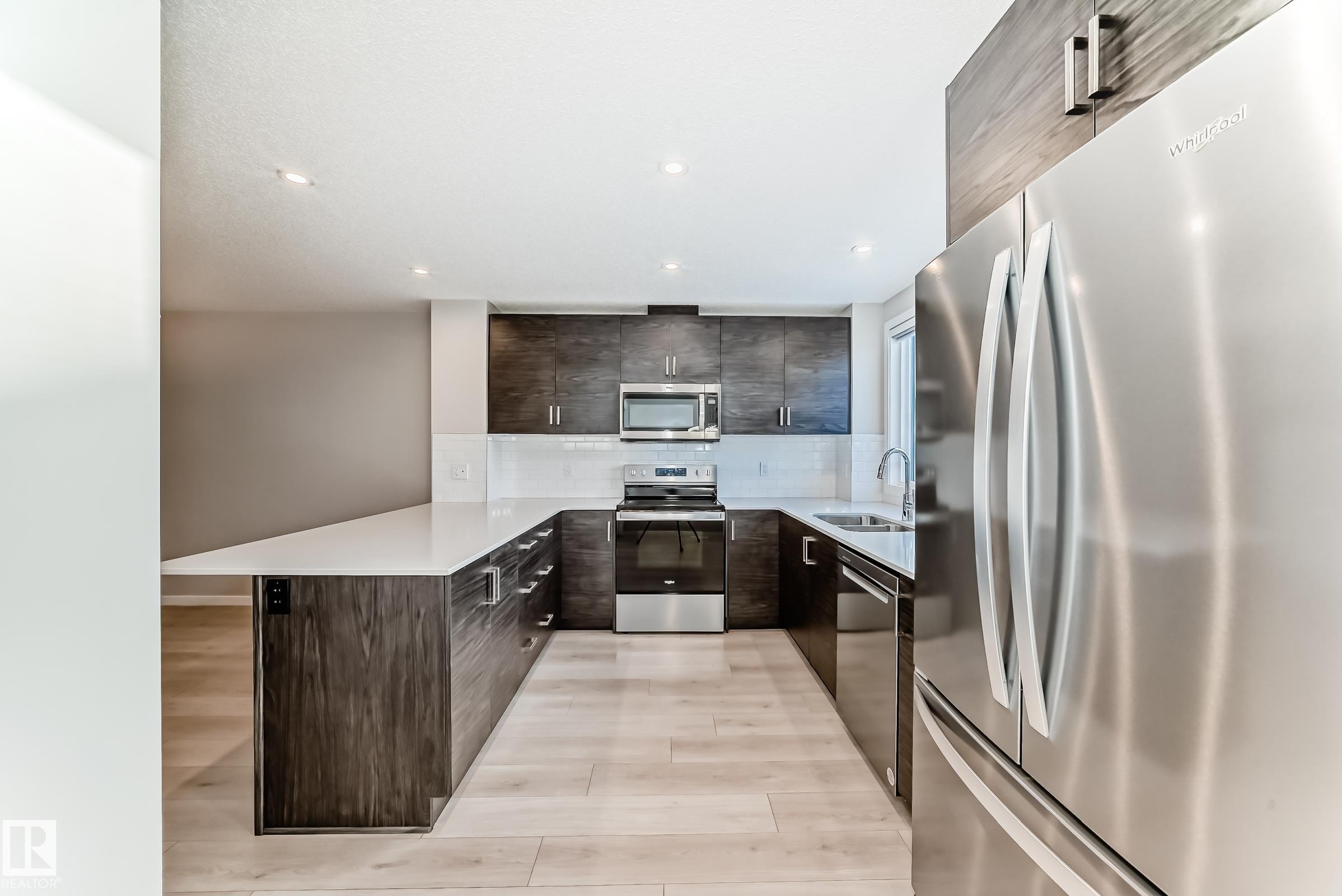 5025 Kinney Link Link, Edmonton, AB - Indoor Photo Showing Kitchen With Stainless Steel Kitchen With Double Sink With Upgraded Kitchen