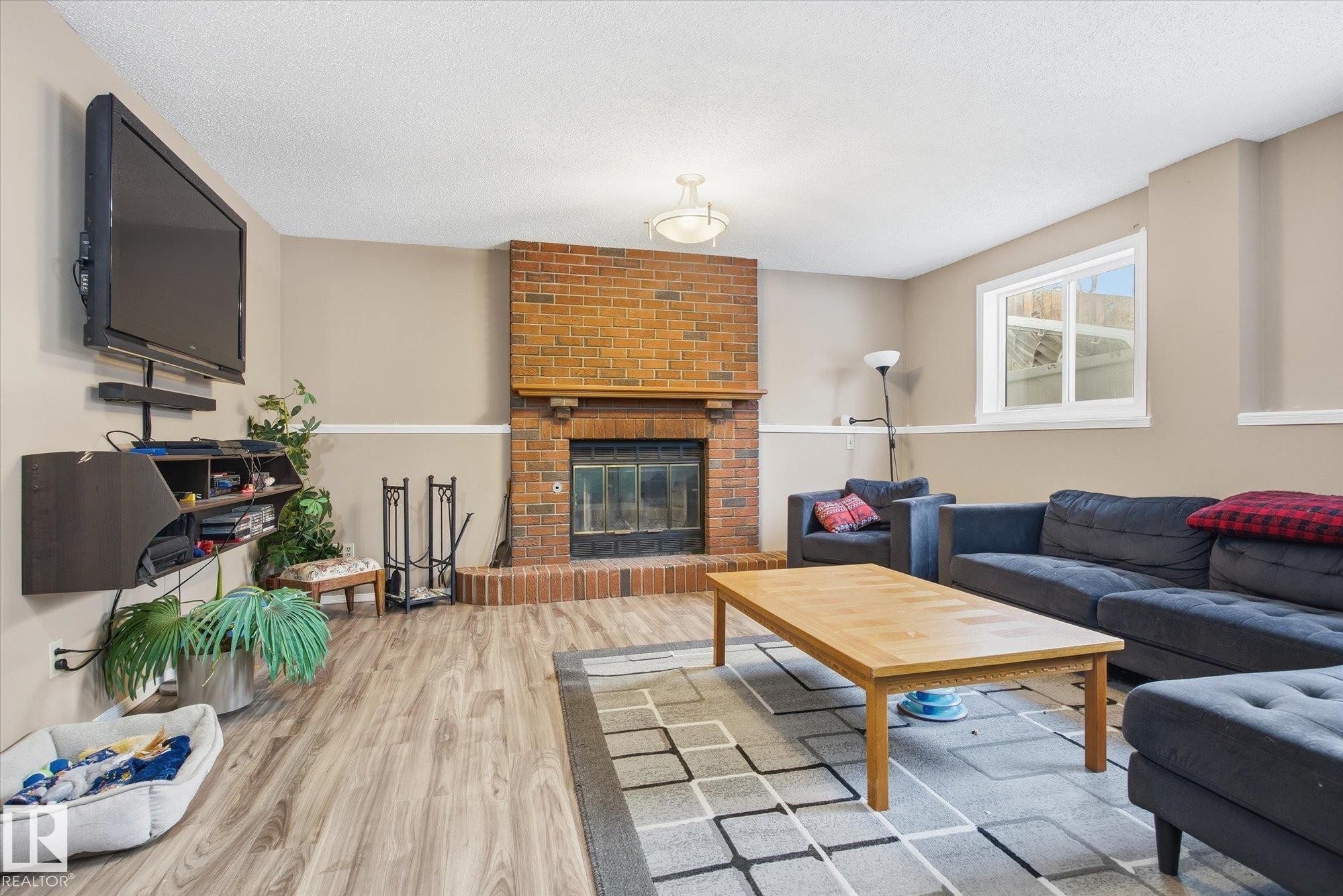 67A Arbor Crescent, St. Albert, AB - Indoor Photo Showing Living Room With Fireplace