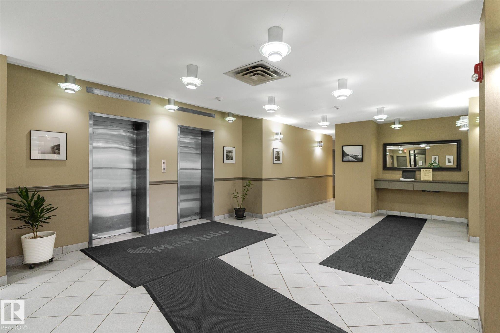 View of community lobby - 304 9725 106 Street, Edmonton, AB - Indoor Photo Showing Other Room