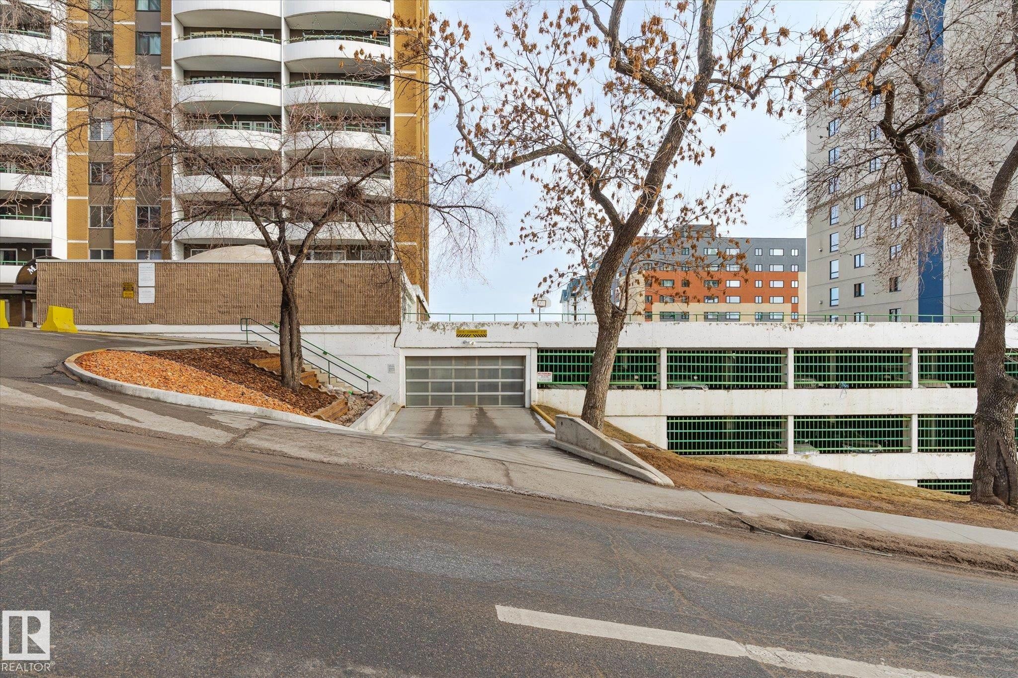 View of property's community featuring a garage - 304 9725 106 Street, Edmonton, AB - Outdoor