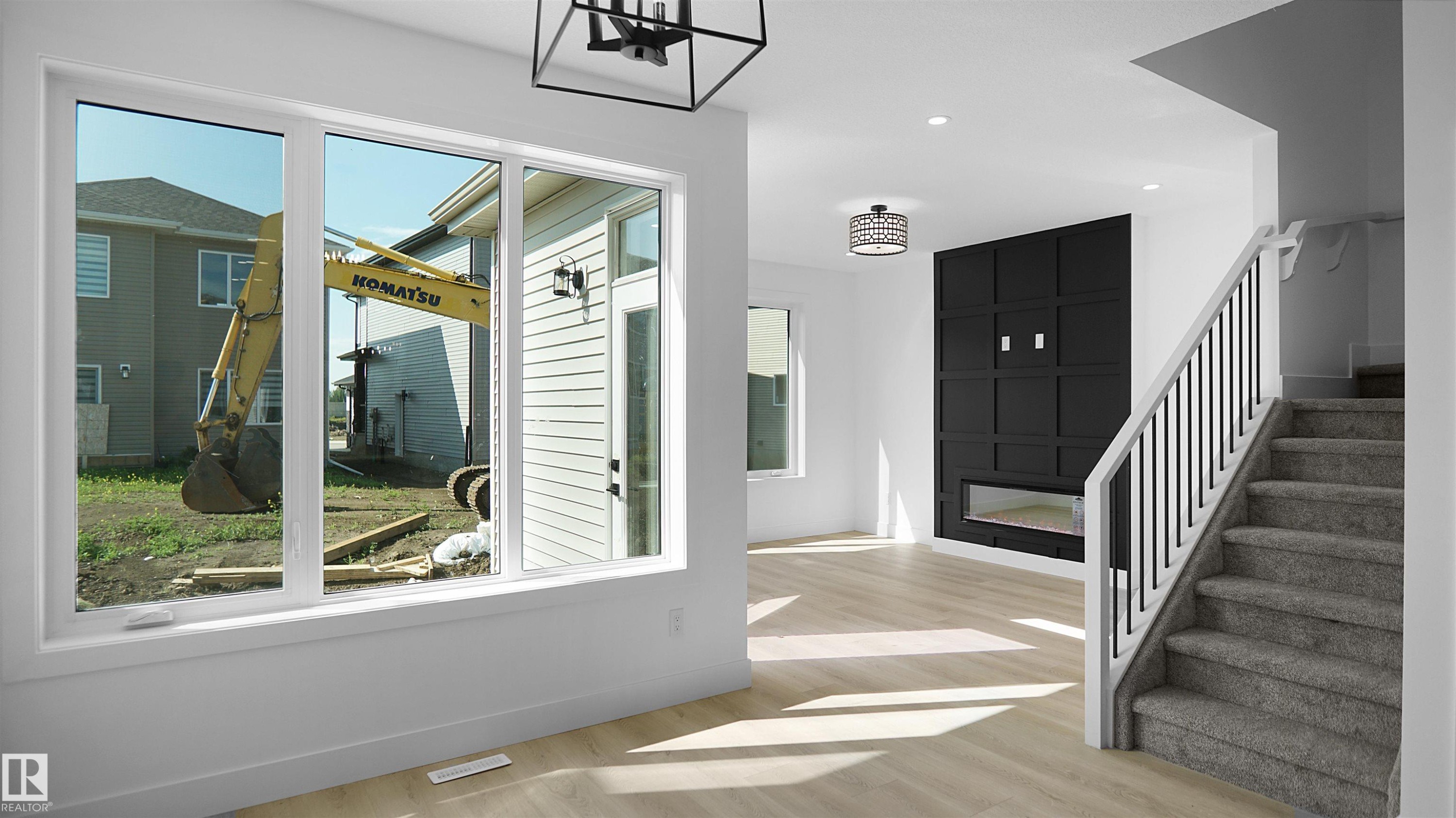 Entryway featuring light wood finished floors and recessed lighting - 711 31 Avenue, Edmonton, AB - Indoor Photo Showing Other Room