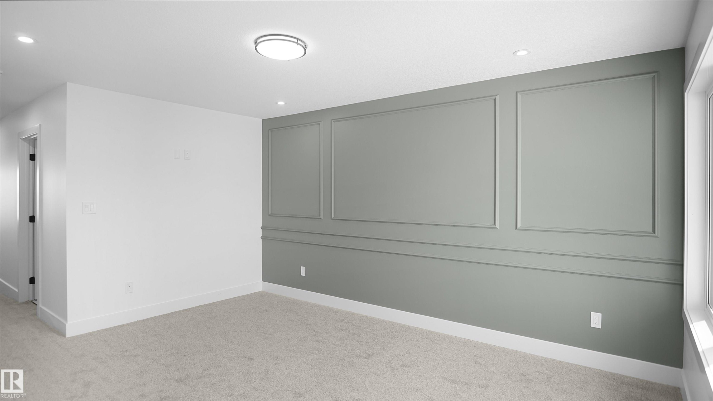 Carpeted spare room featuring recessed lighting - 711 31 Avenue, Edmonton, AB - Indoor Photo Showing Other Room