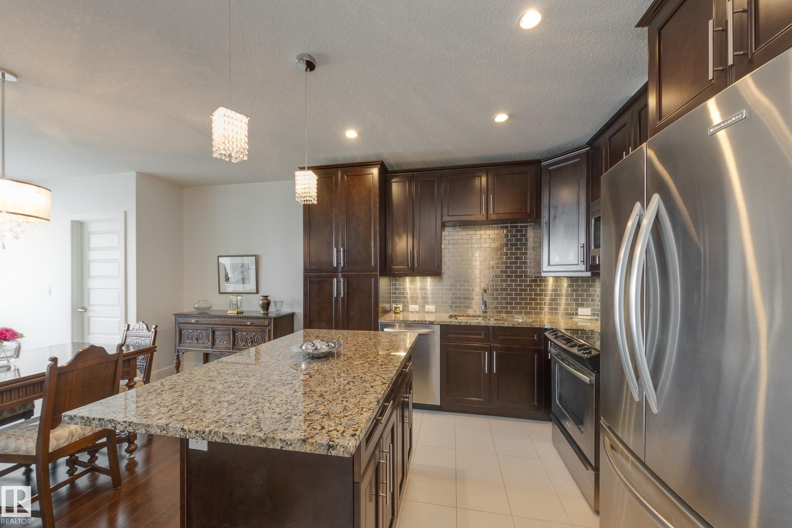 403 1350 Windermere Way, Edmonton, AB - Indoor Photo Showing Kitchen With Stainless Steel Kitchen With Upgraded Kitchen