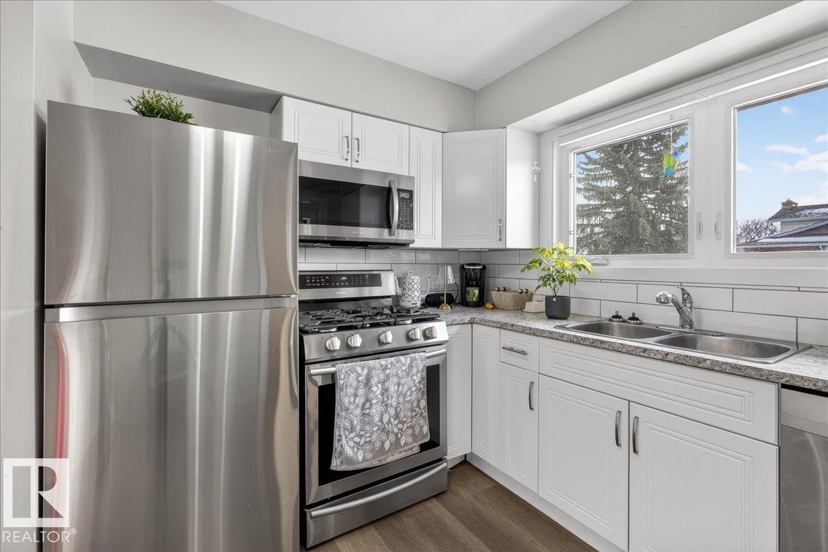 9909 77 Street, Edmonton, AB - Indoor Photo Showing Kitchen With Double Sink