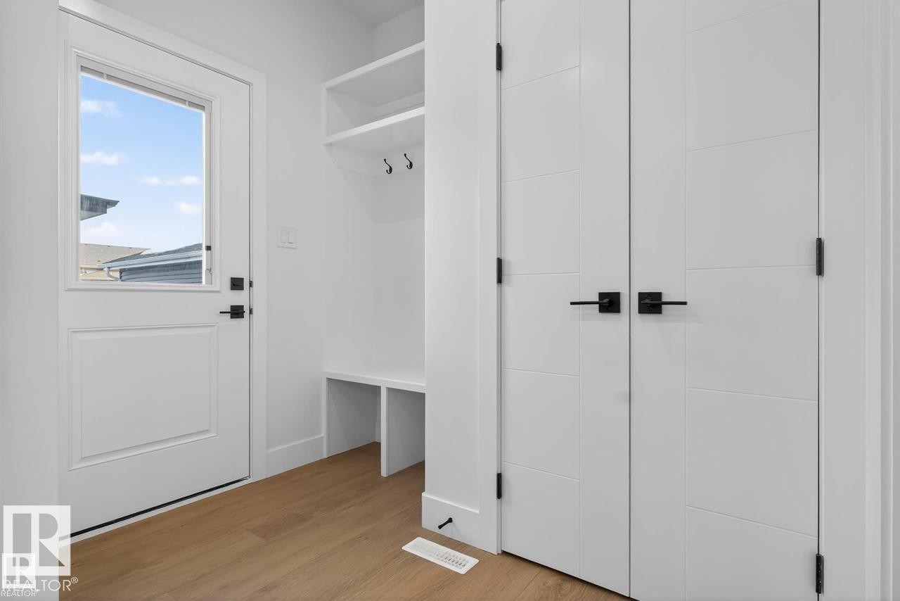Mudroom with light wood-type flooring - 47 River Birch Way, St. Albert, AB - Indoor Photo Showing Other Room