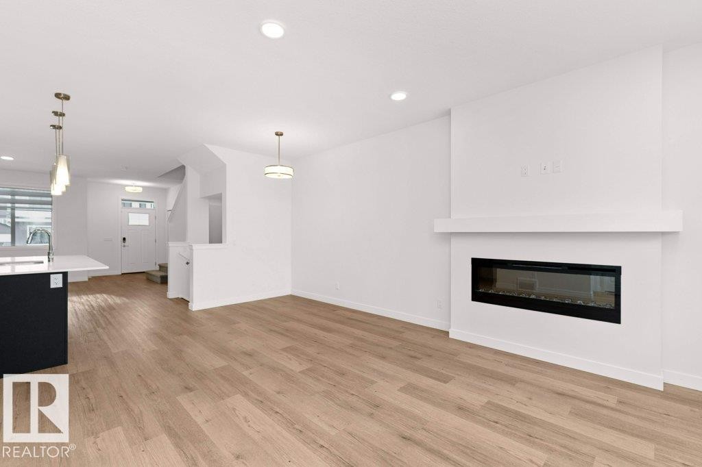 1529 Plum Circle, Edmonton, AB - Indoor Photo Showing Living Room With Fireplace