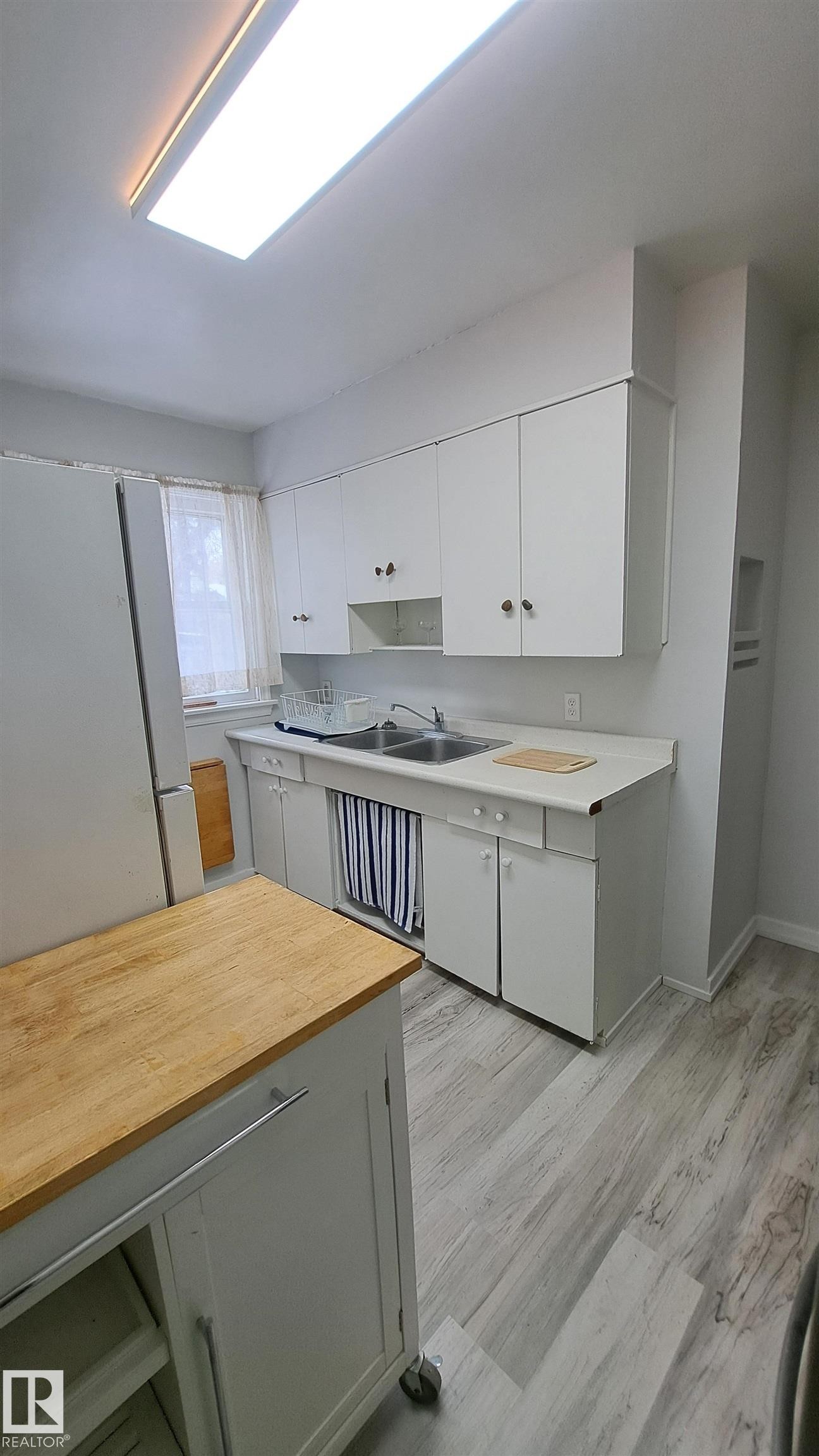 10830 68 Avenue, Edmonton, AB - Indoor Photo Showing Kitchen With Double Sink